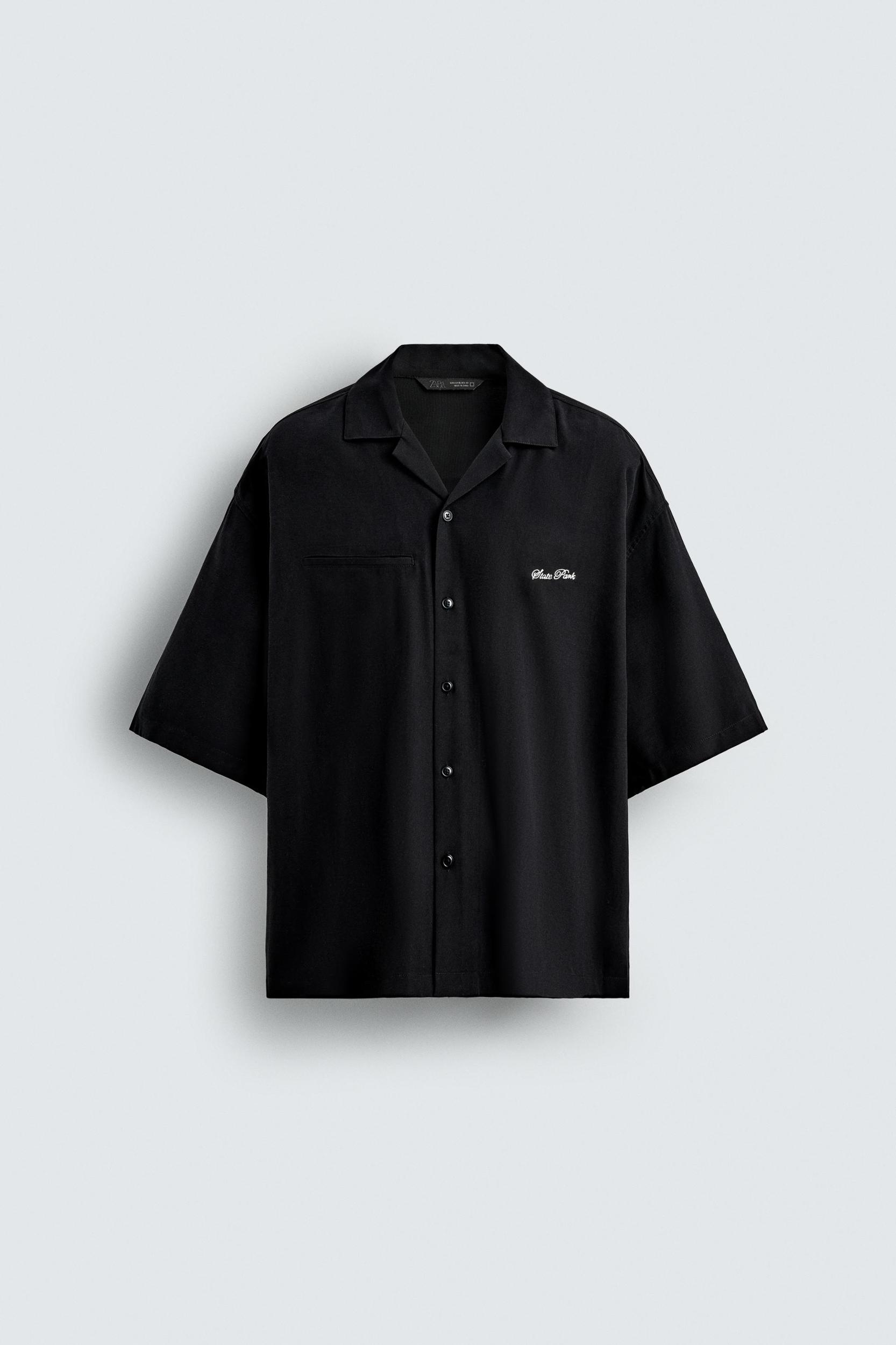 FLOWY SHIRT WITH EMBROIDERED TEXT Product Image
