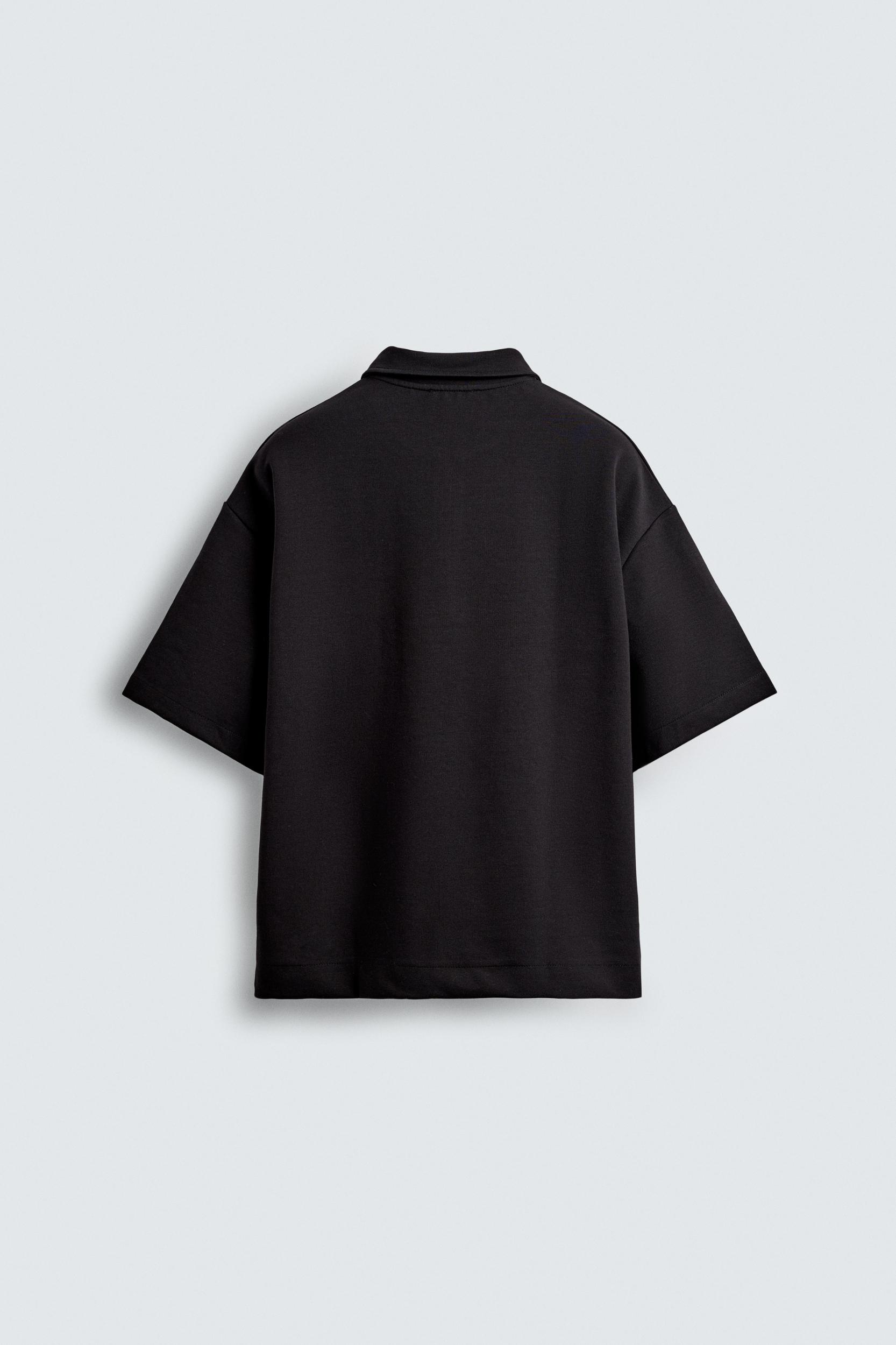 INTERLOCK ZIP POLO SHIRT Product Image