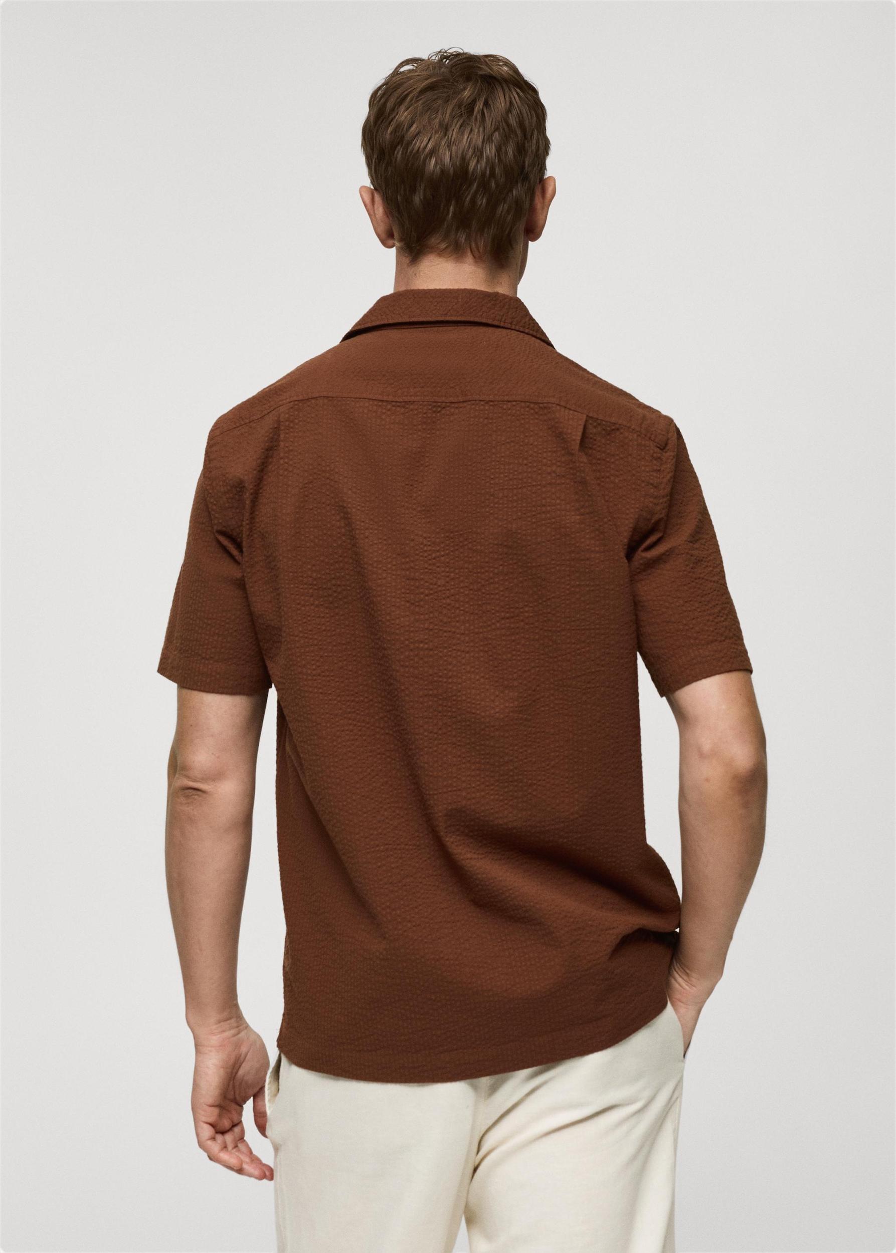 Regular-fit 100% seersucker cotton shirt - Men | MANGO USA Product Image