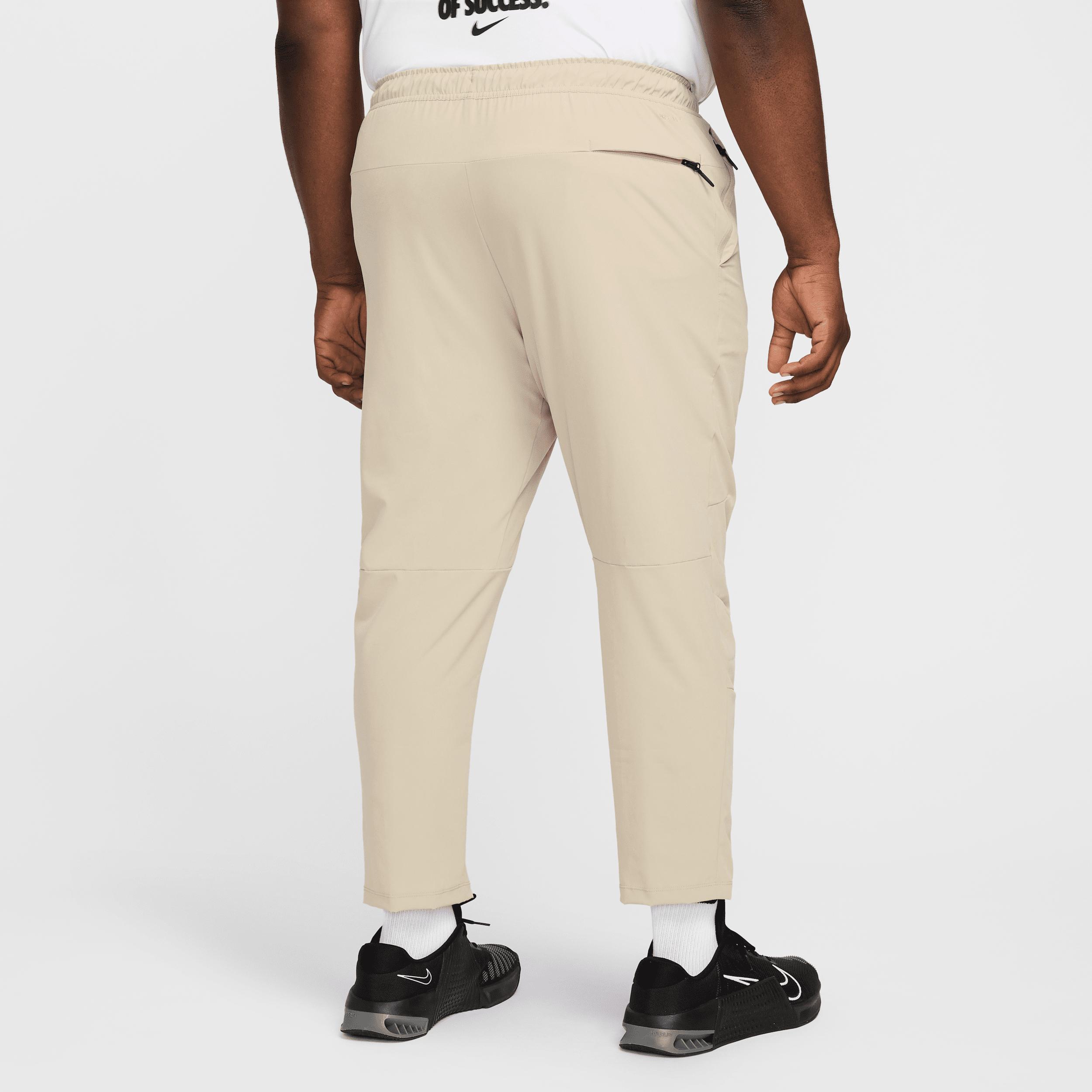 Nike Mens Unlimited Dri-FIT Tapered Leg Versatile Pants | FB7546-251 Product Image