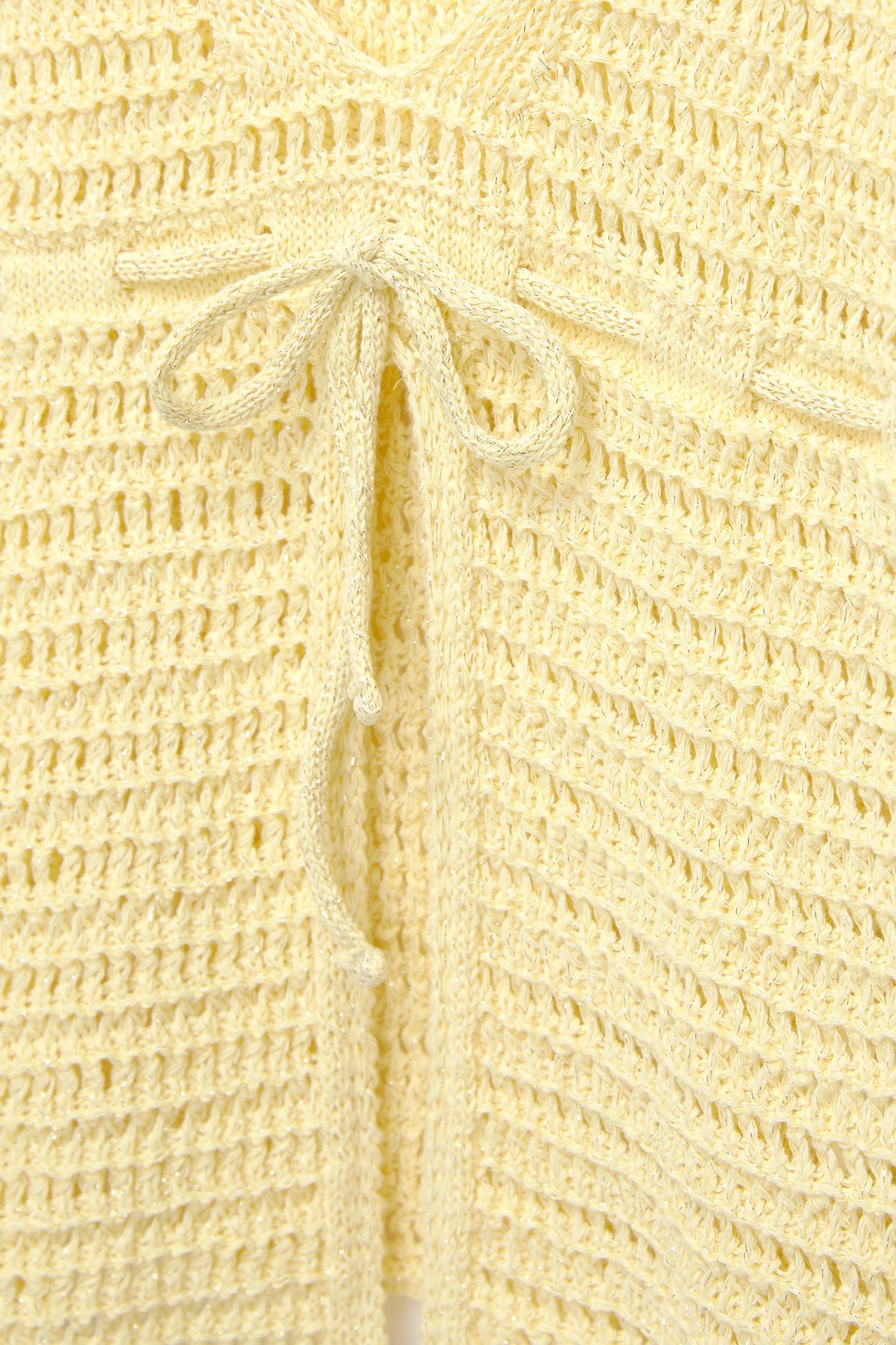 Crochet top with tied bow Product Image