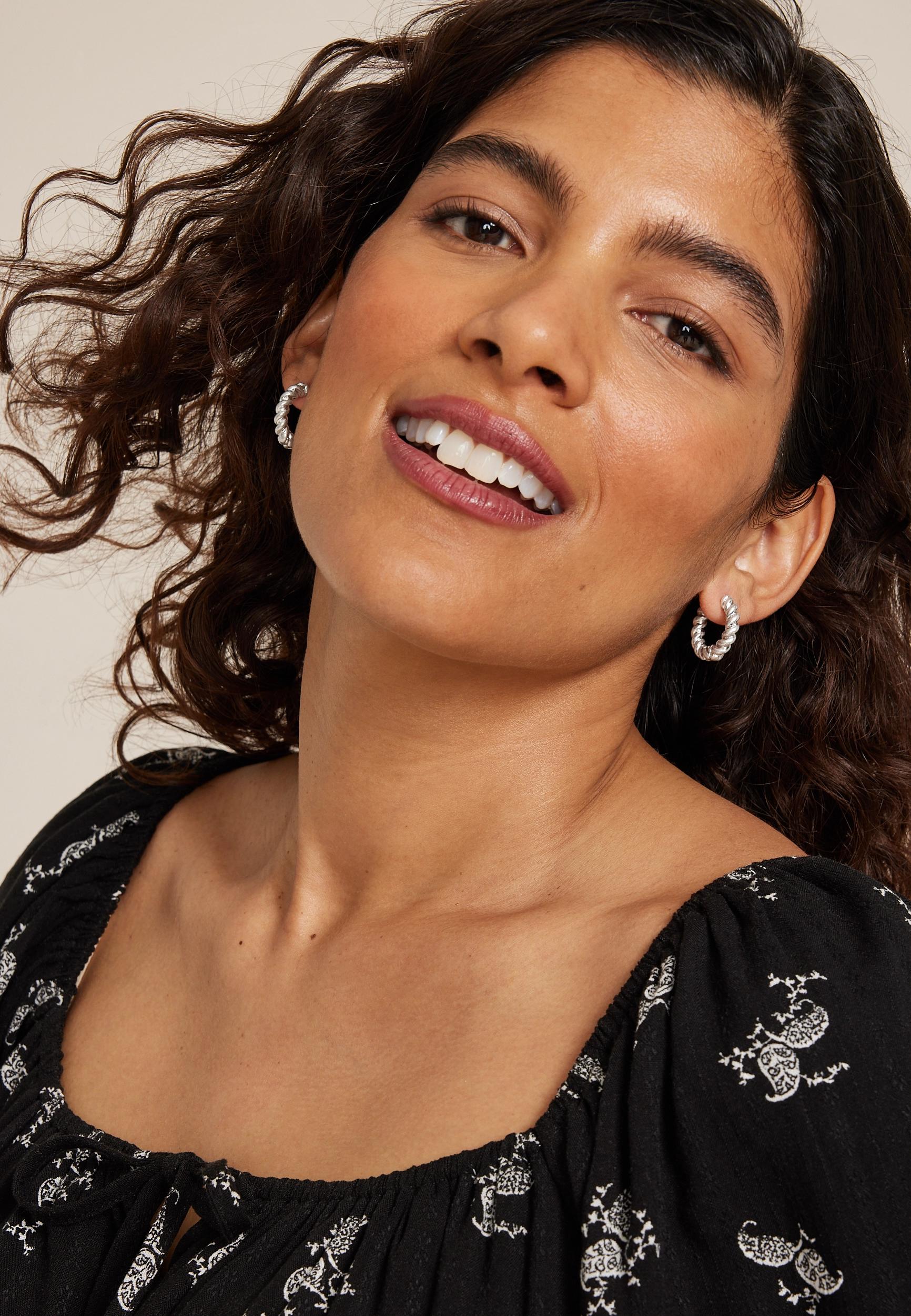 Silver Twisted Huggie Hoop Earrings Product Image