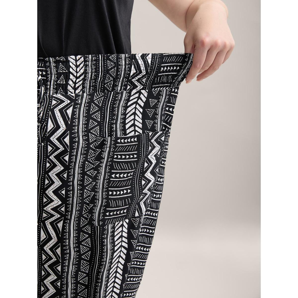 Plus Size Boho Stripes Tassels Jogger Pants Women Black Resort Mid Rise Vacation Pants BloomChic 26/4X Product Image