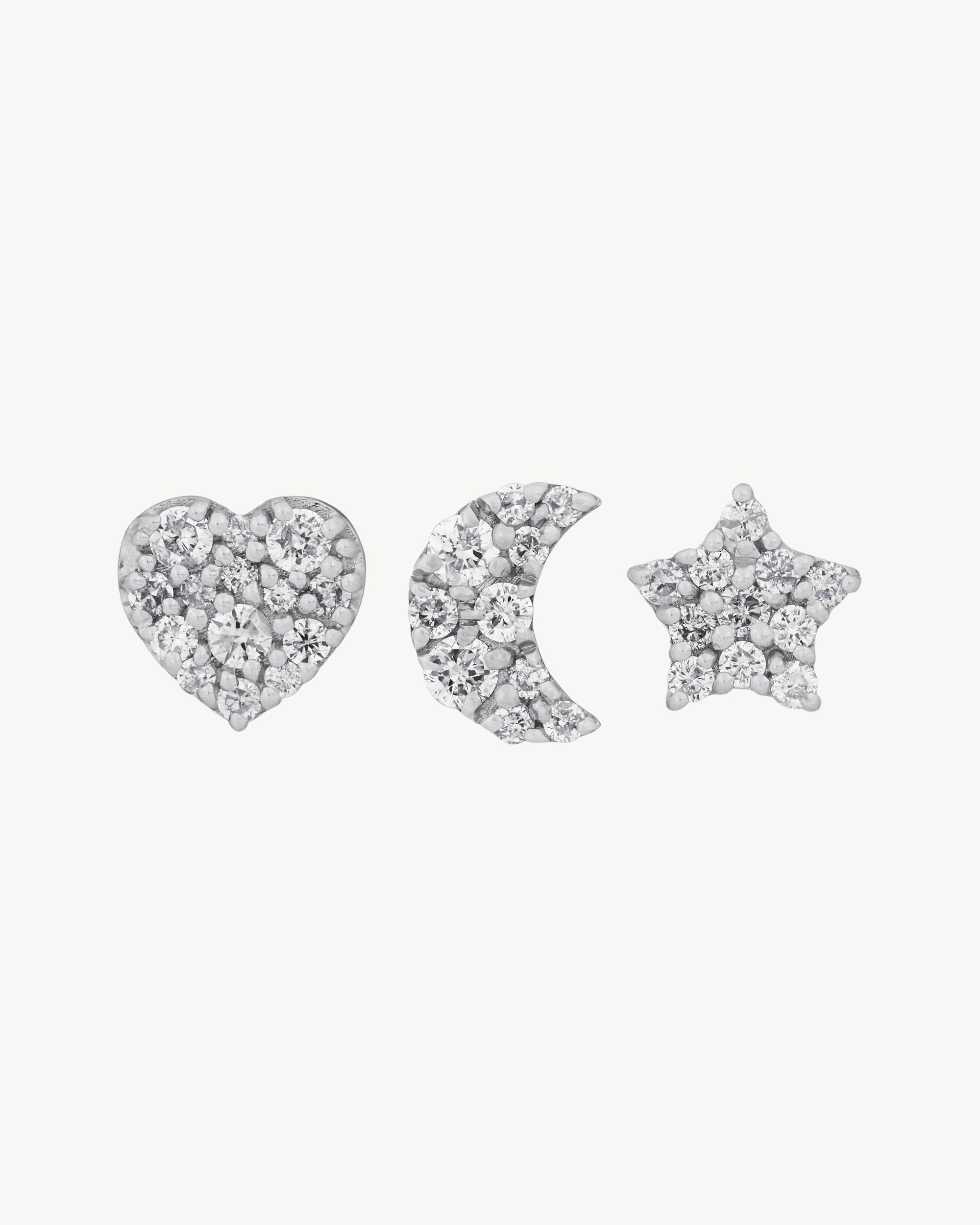 Charm brooches in 18K grey gold and diamonds Product Image