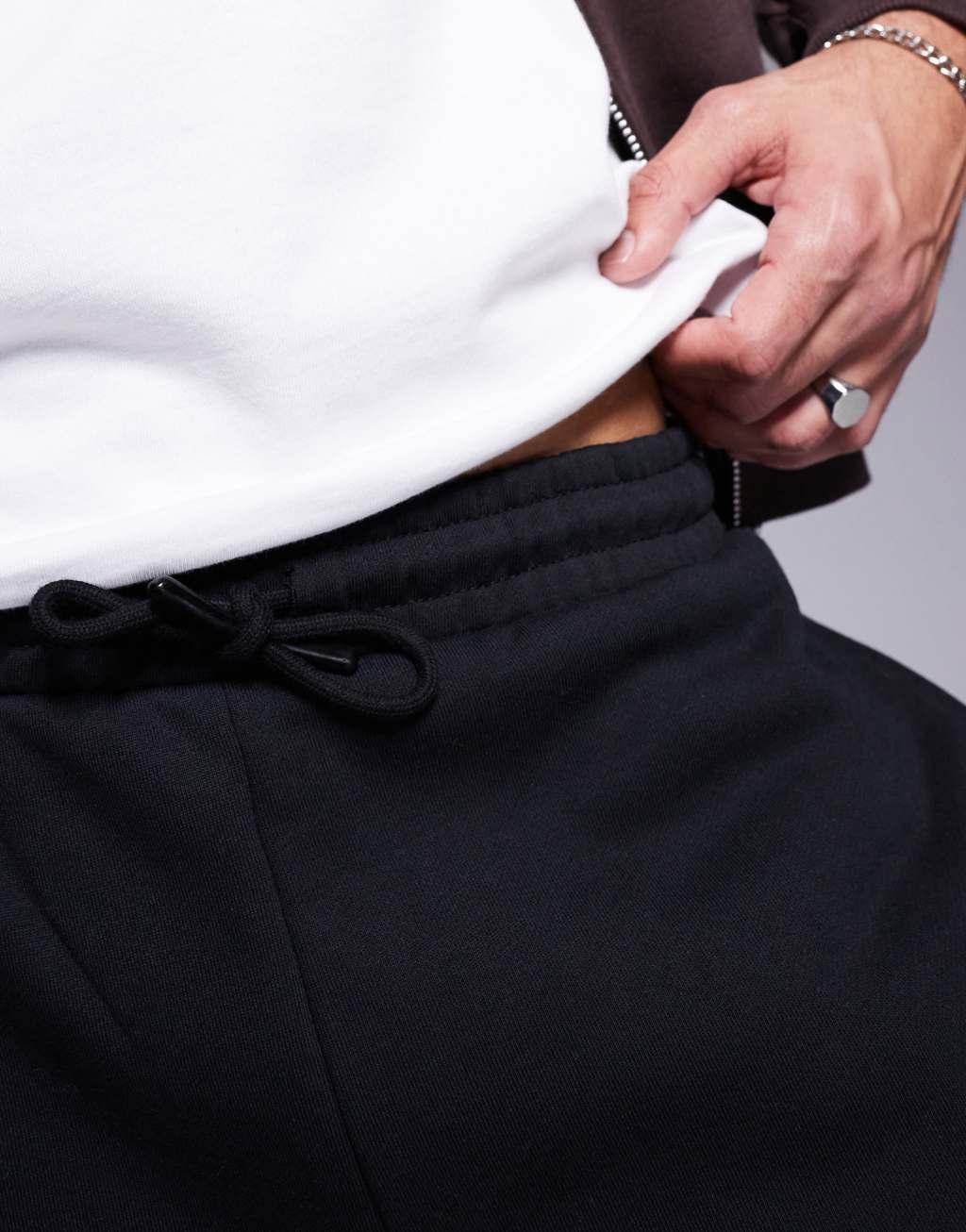 ASOS DESIGN premium heavyweight tapered sweatpants 400gsm in black Product Image