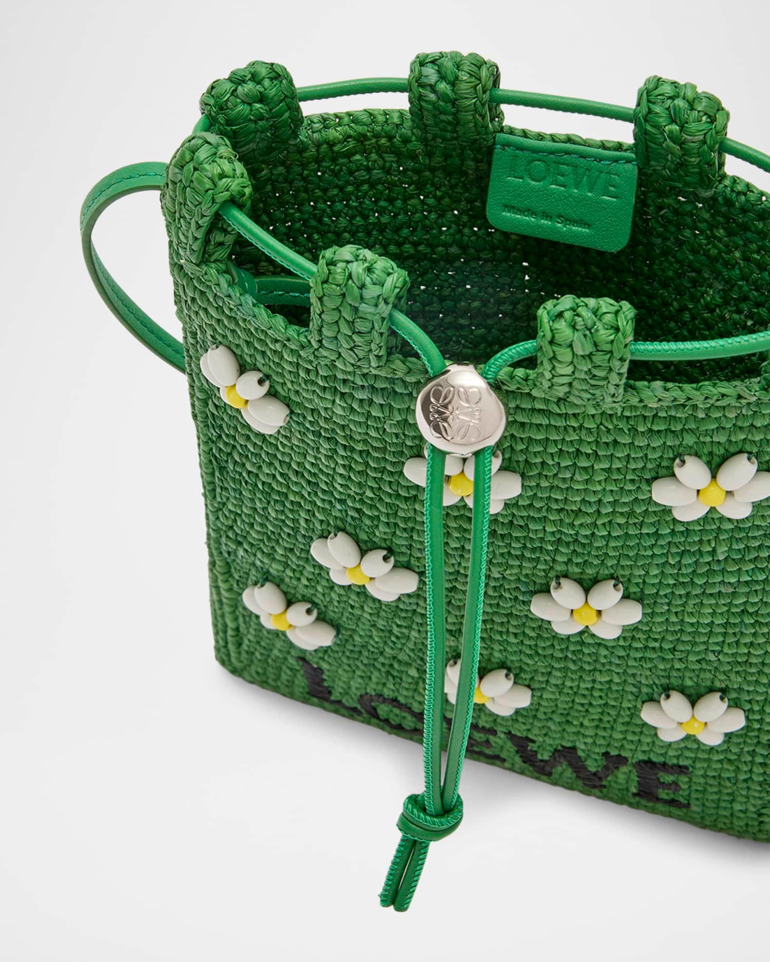 x Paula’s Ibiza Drawstring Pocket Flower Crossbody Bag in Raffia Product Image