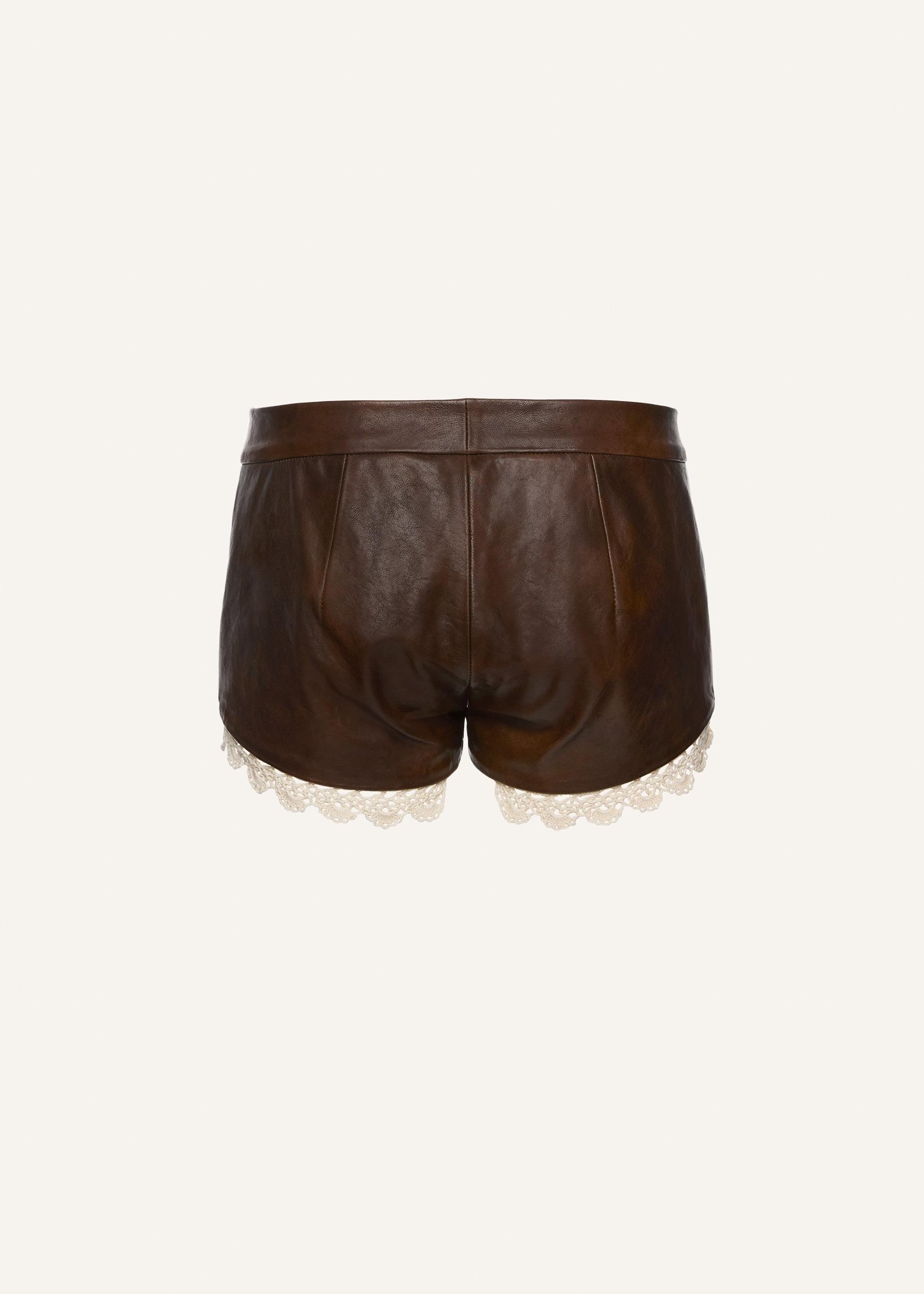 Lace trim leather shorts in brown Product Image