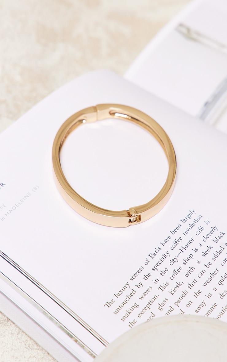 Gold Chunky Clasp Bangle Product Image