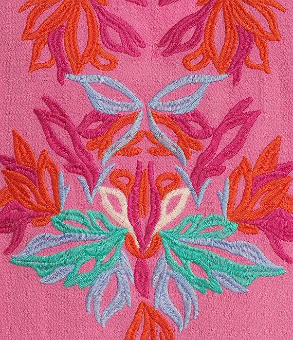 Calessa Embroidered Ruffled V-Neck Cap Sleeve Shirttail Hem Top Product Image