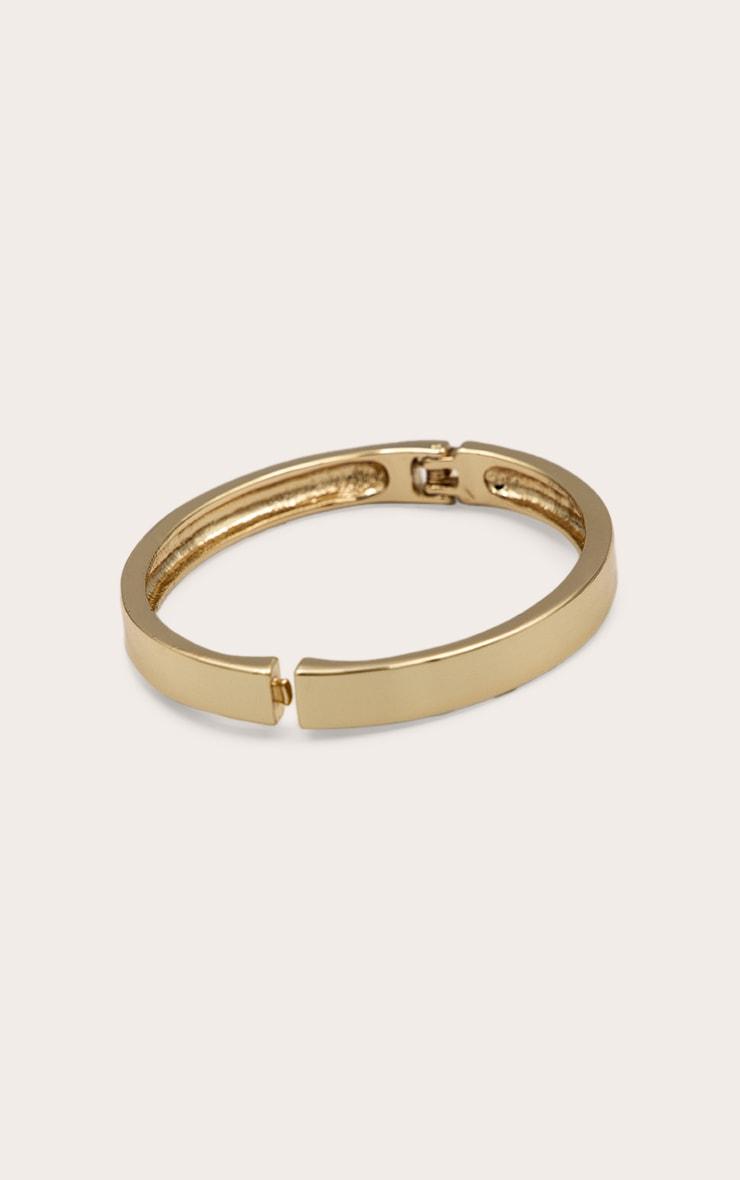 Gold Chunky Clasp Bangle Product Image
