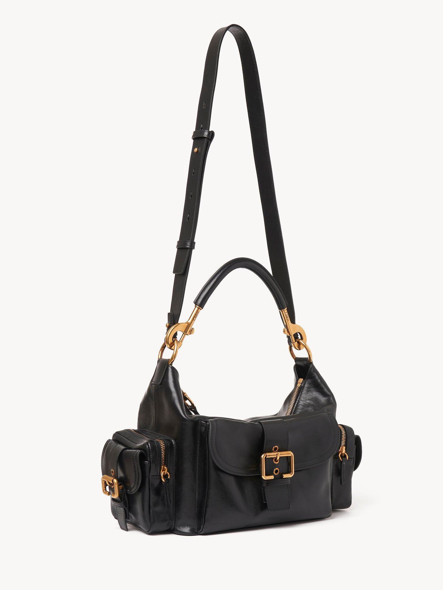 Camera bag in shiny leather Product Image