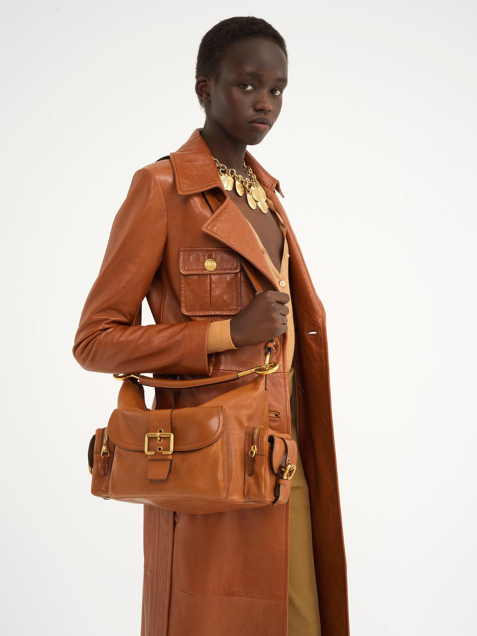 Camera bag in shiny leather Product Image