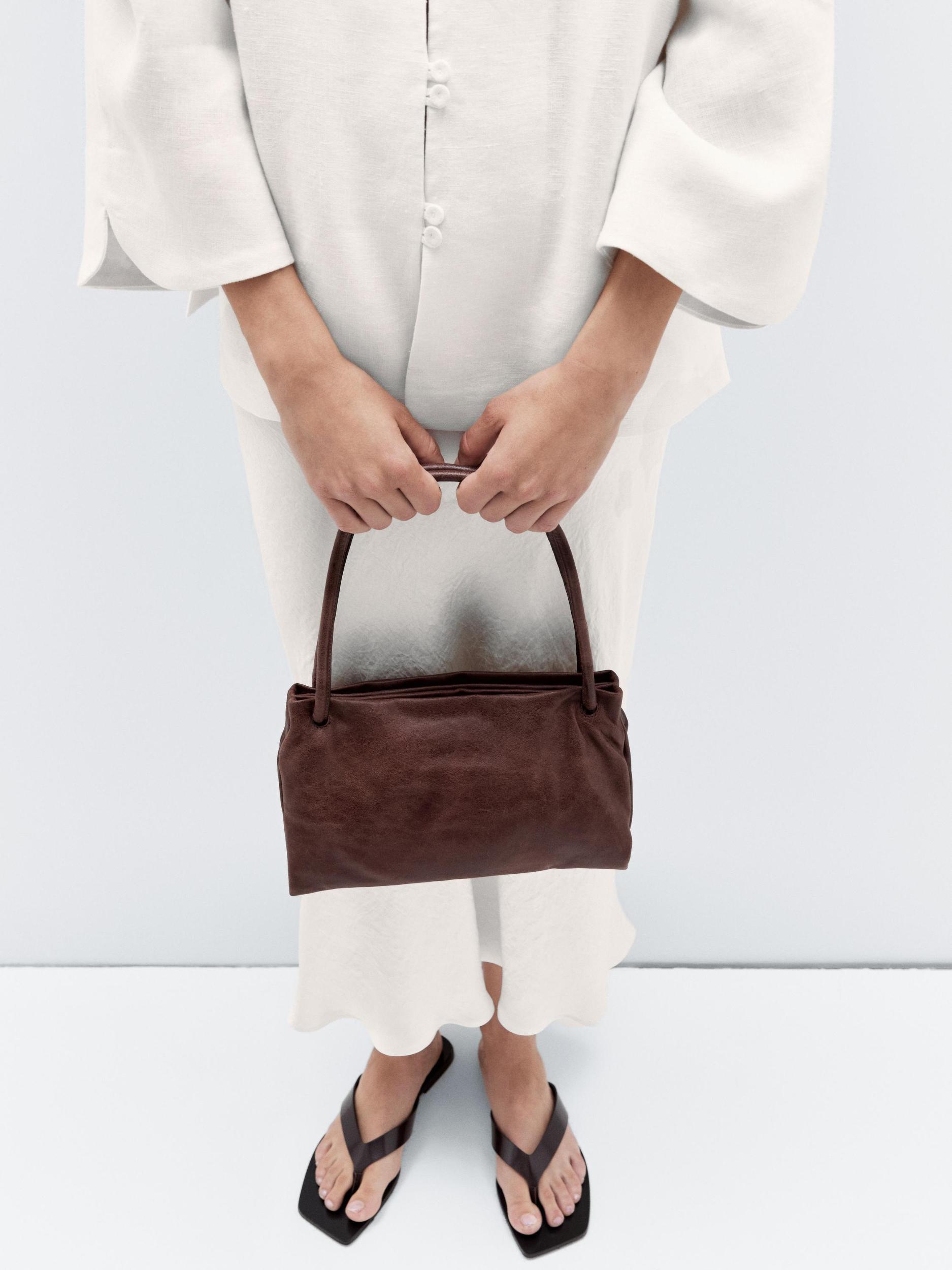 Small nappa leather bag with compartments Product Image