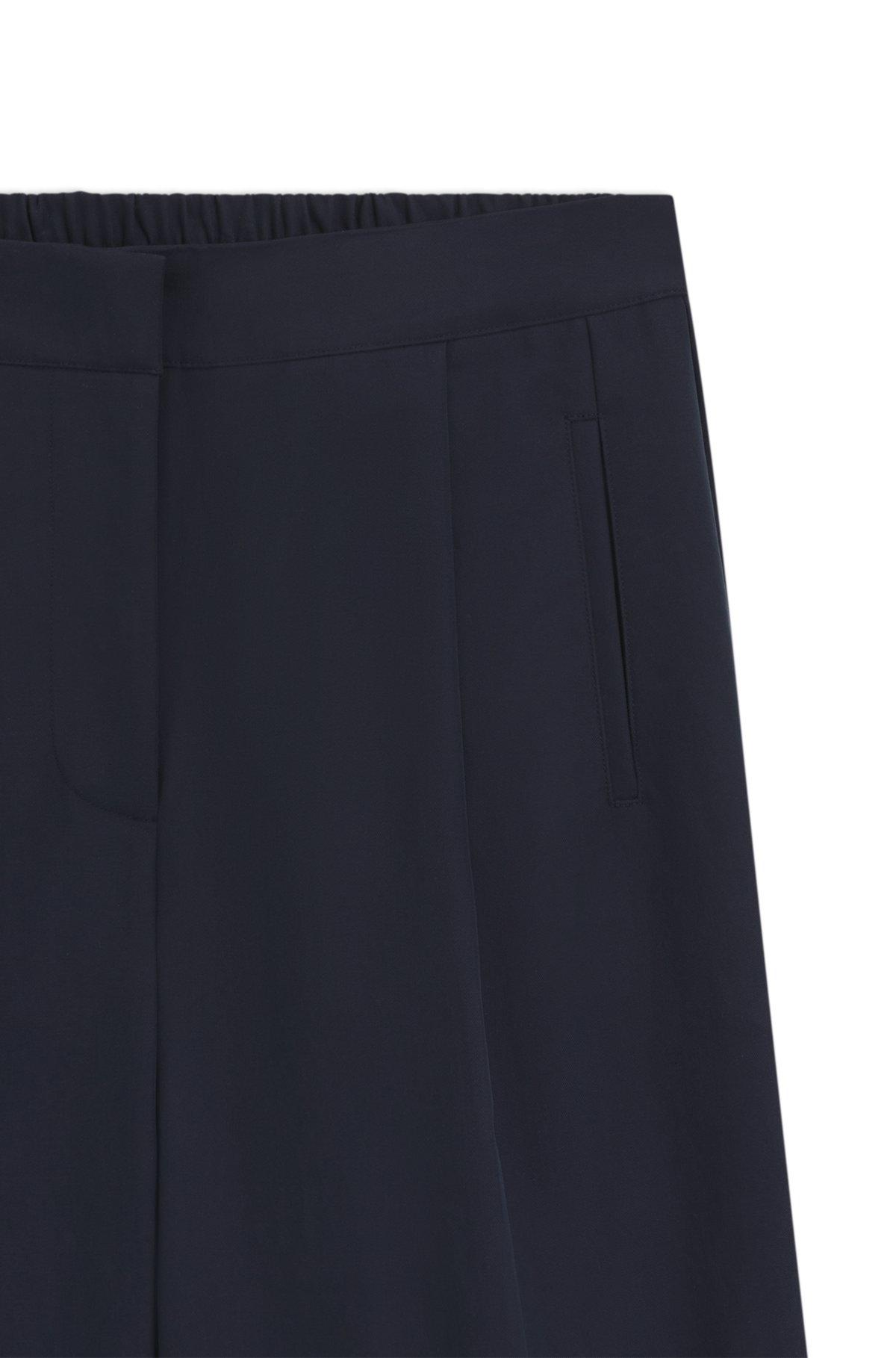 Formal trousers with pleat details Product Image