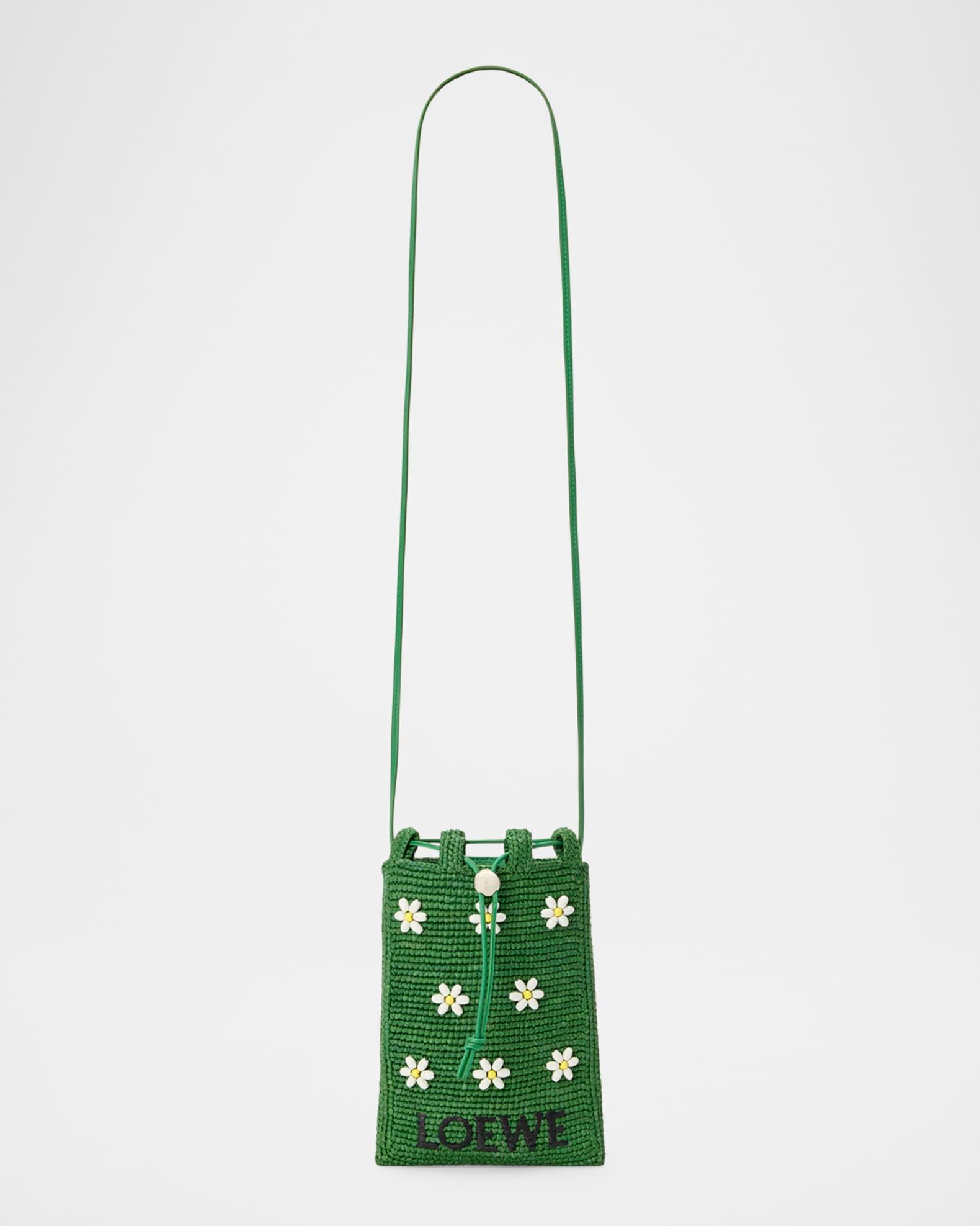 x Paula’s Ibiza Drawstring Pocket Flower Crossbody Bag in Raffia Product Image