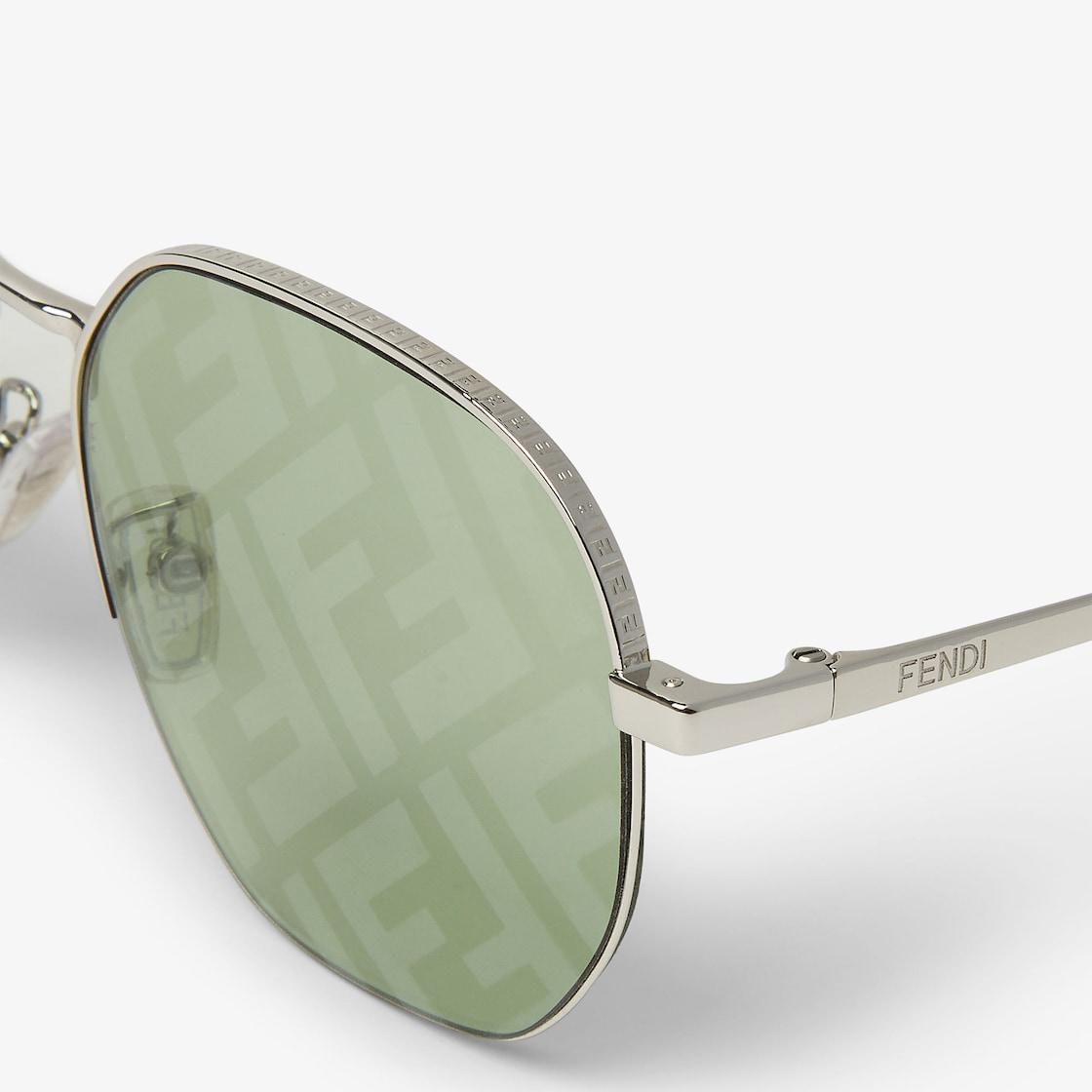Fendi TravelPalladium-color metal sunglasses with photochromic lenses Product Image