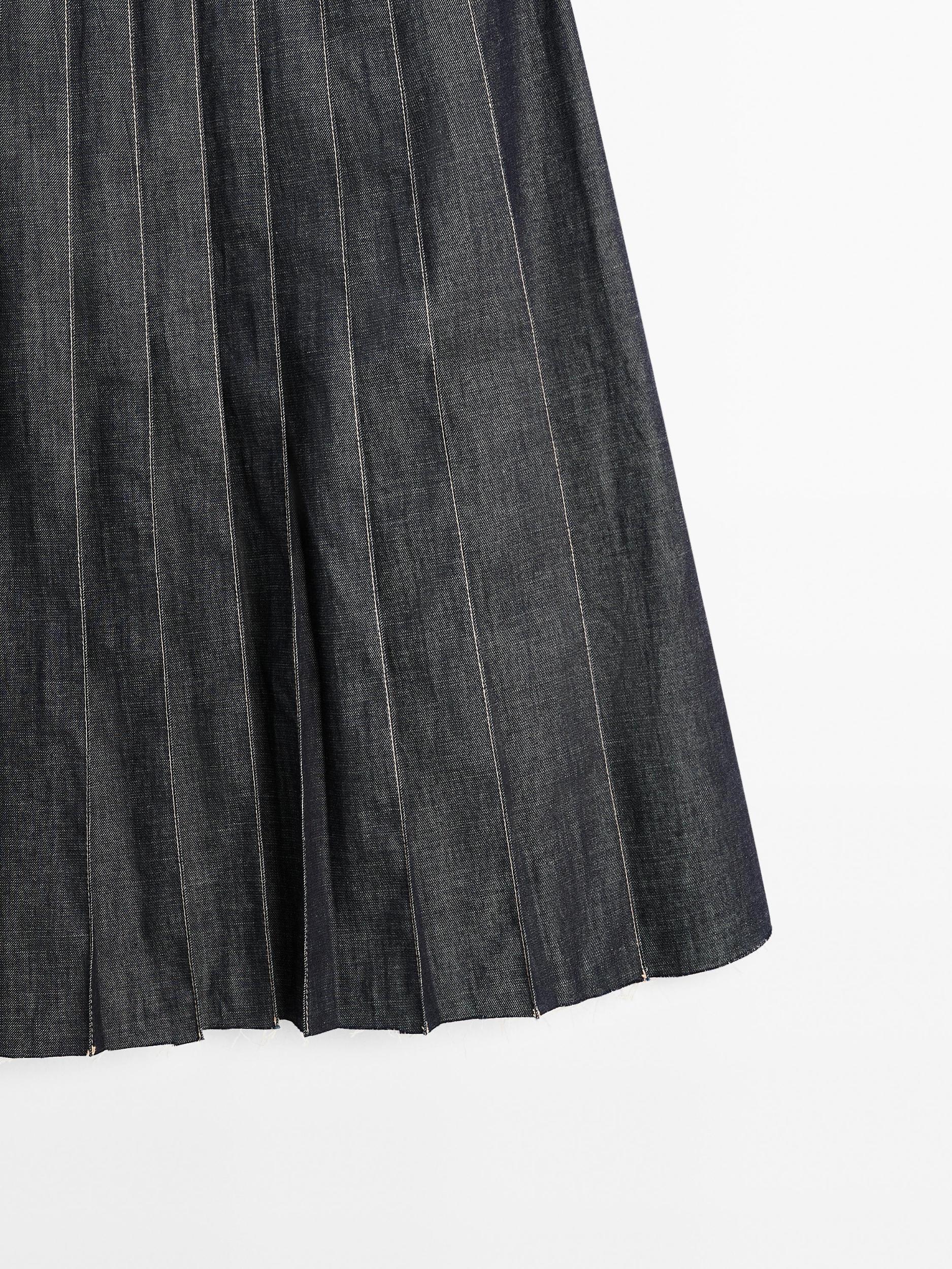 Denim midi skirt with box pleats Product Image