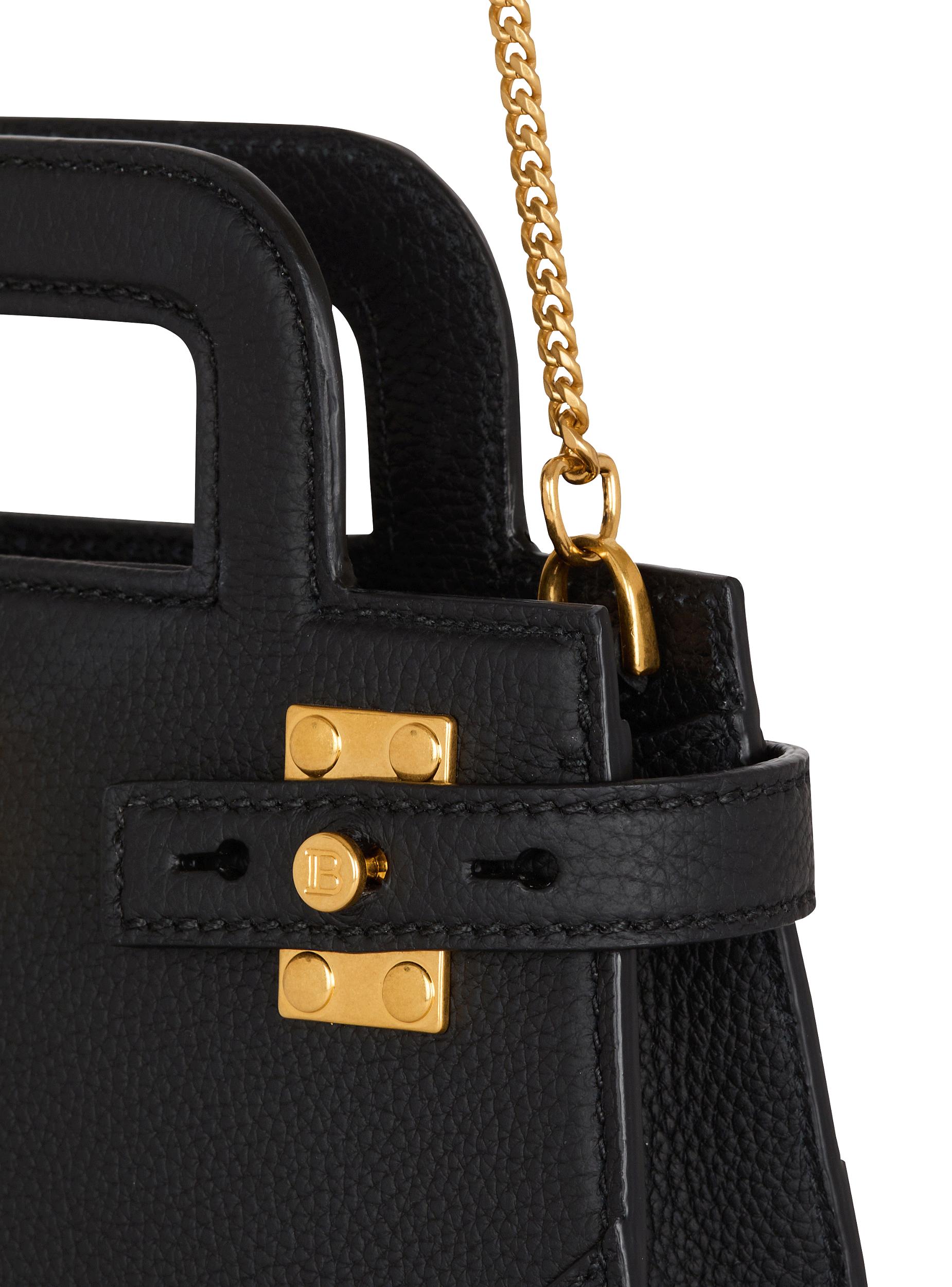 Small B-Buzz Top Handle bag in grained leather Product Image