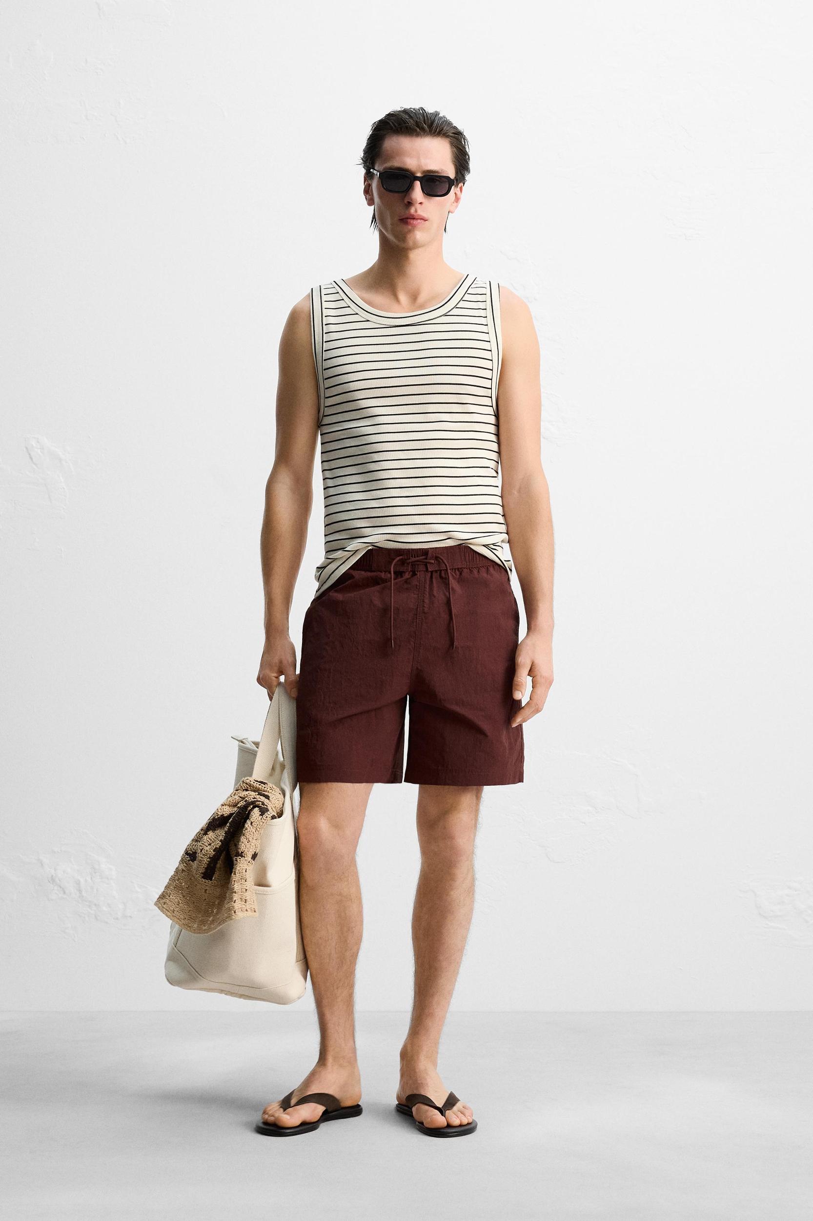 DRAWSTRING SWIM TRUNKS Product Image