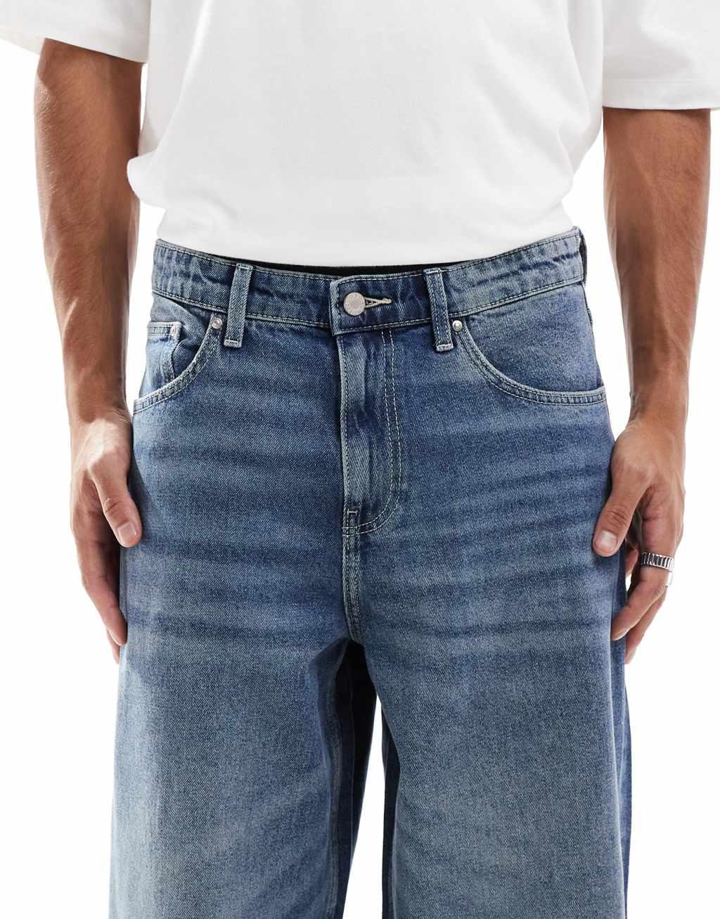 ASOS DESIGN super baggy jeans in mid wash blue Product Image