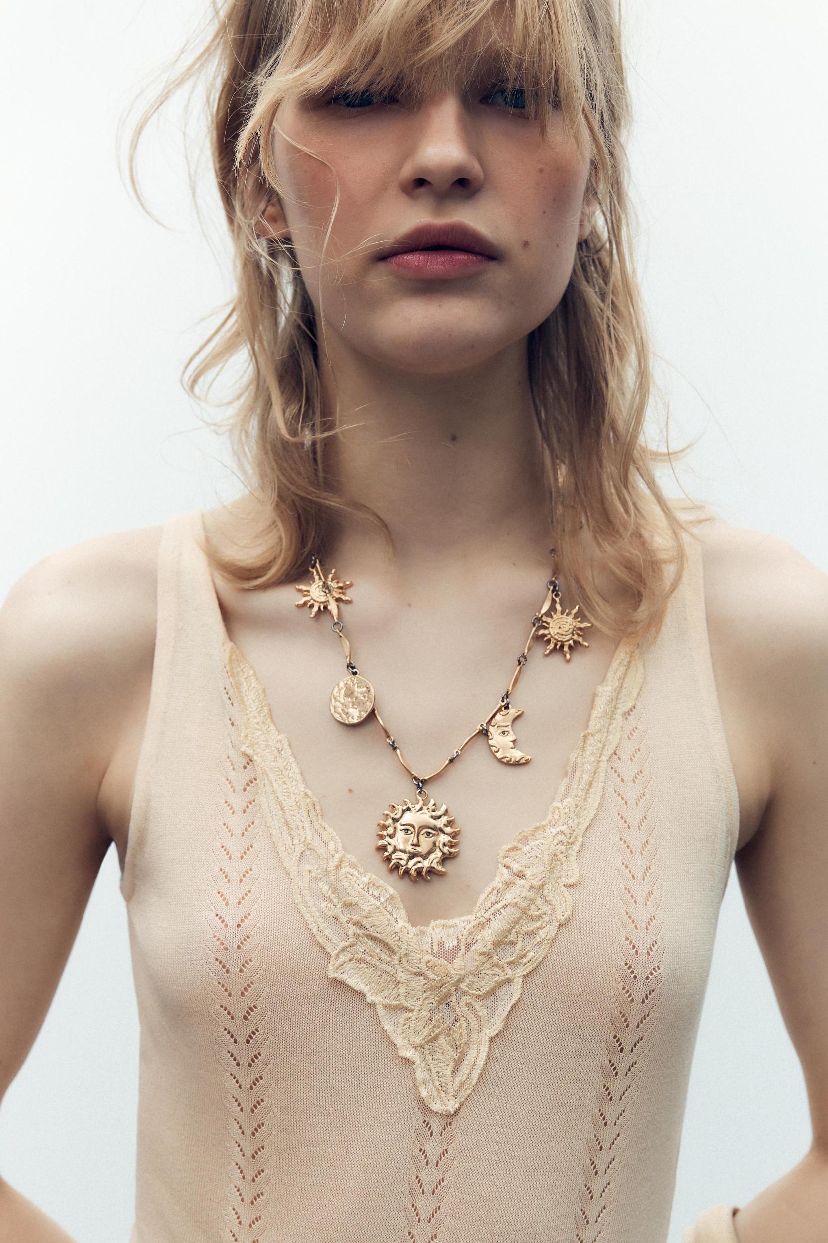 EMBROIDERED KNIT BODYSUIT Product Image