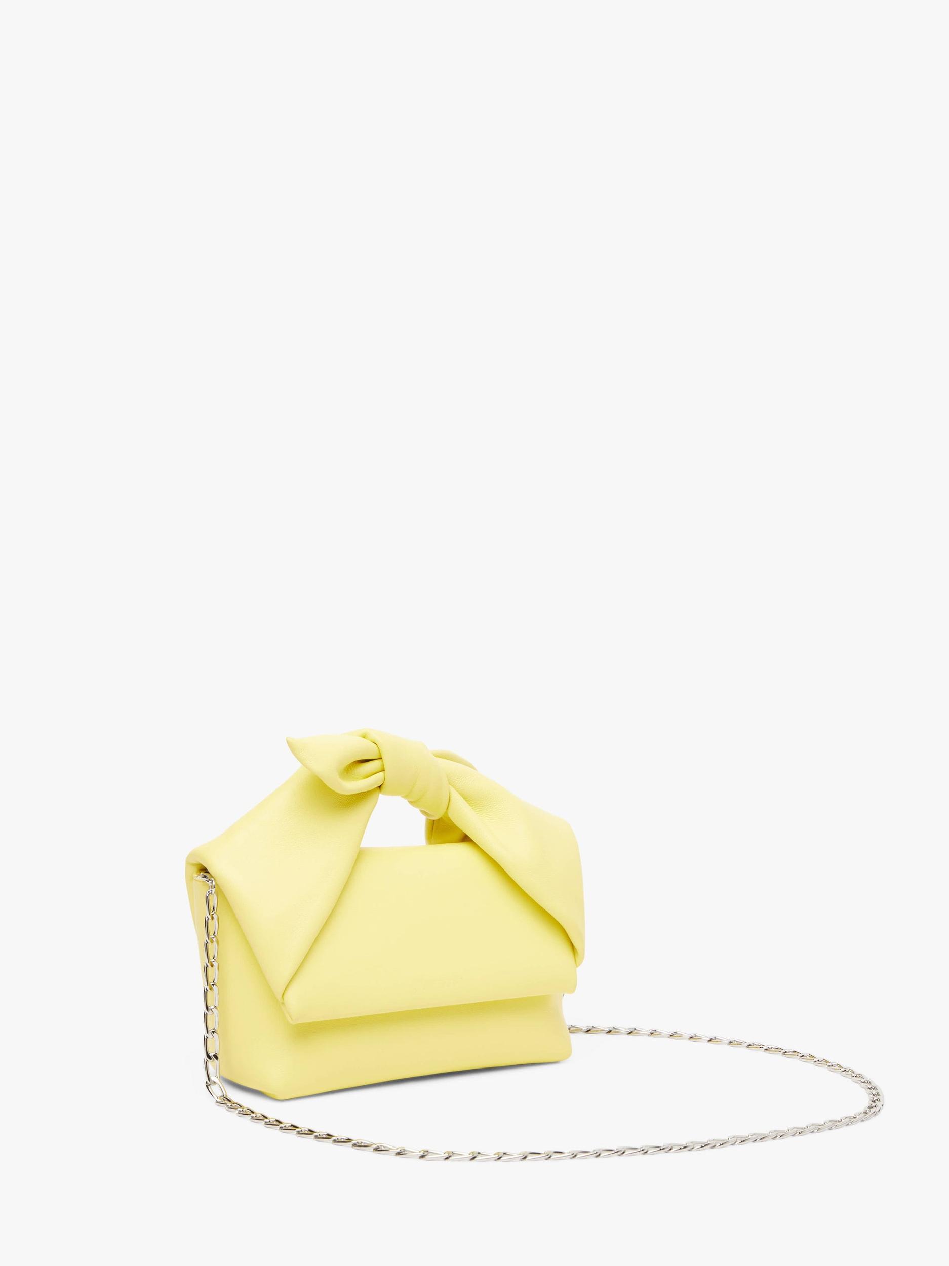 MEDIUM BOW TWISTER - LEATHER TOP HANDLE BAG Product Image