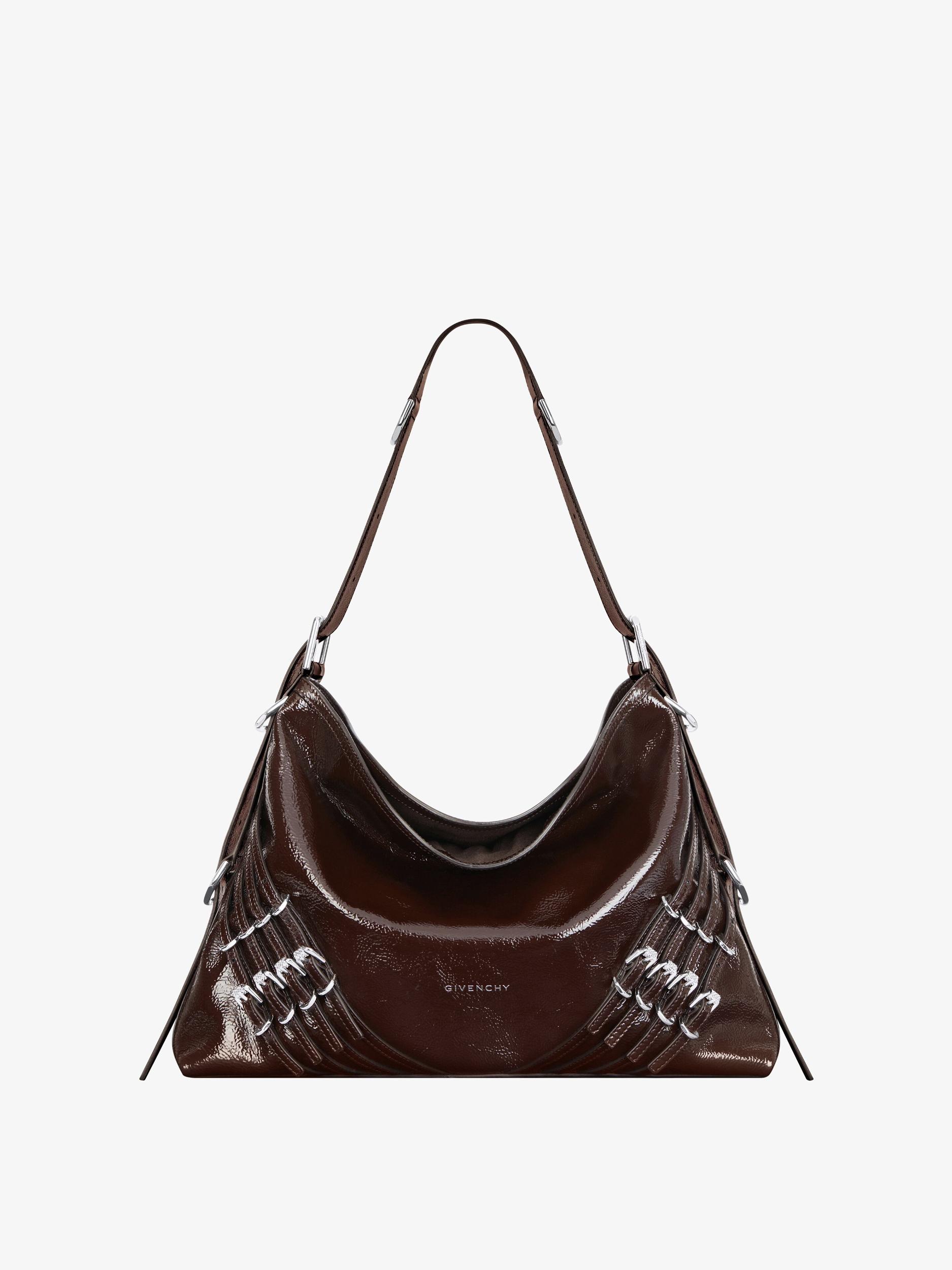 Medium Voyou bag in patent leather with multi-buckles Product Image