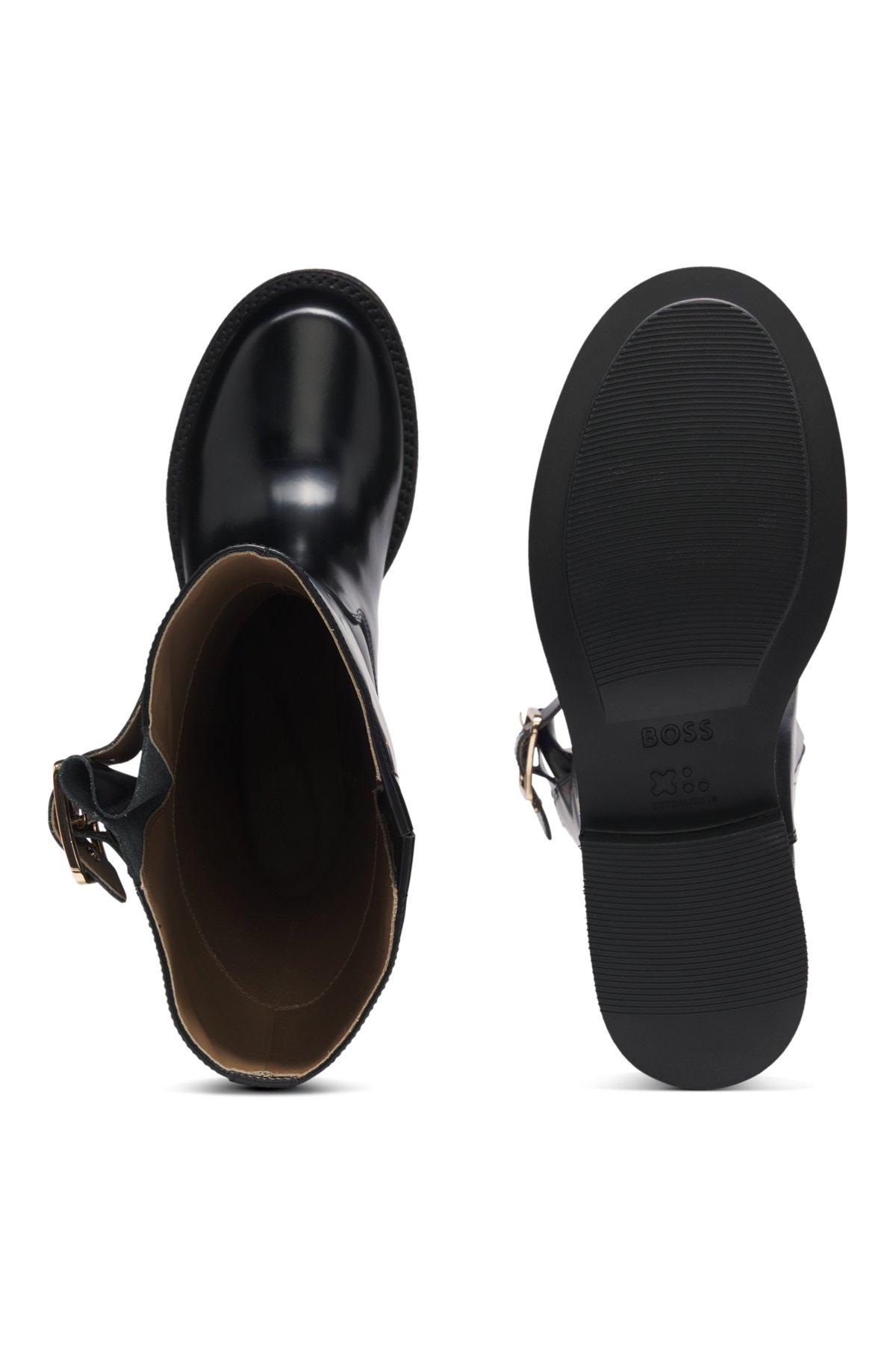 Knee boots in brush-off leather Product Image