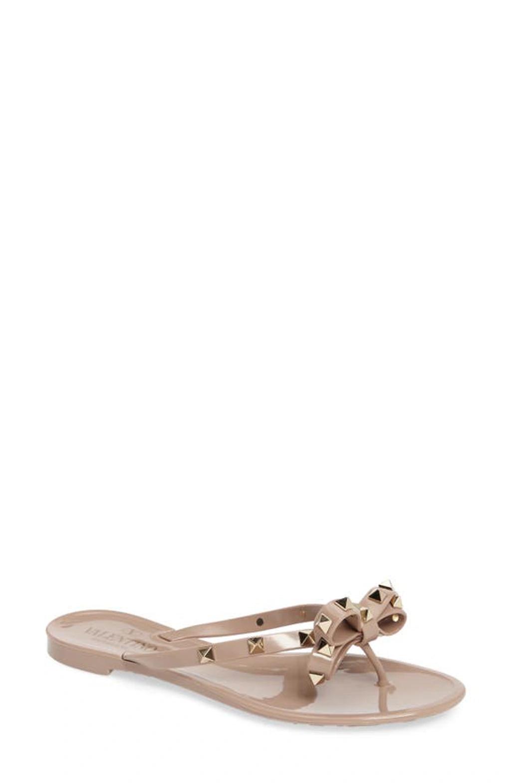 VALENTINO GARAVANI Women Rockstud Rubber Flip Flops In Beige Product Image