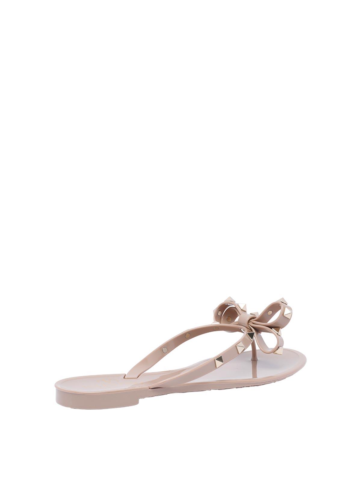 VALENTINO GARAVANI Women Rockstud Rubber Flip Flops In Beige Product Image