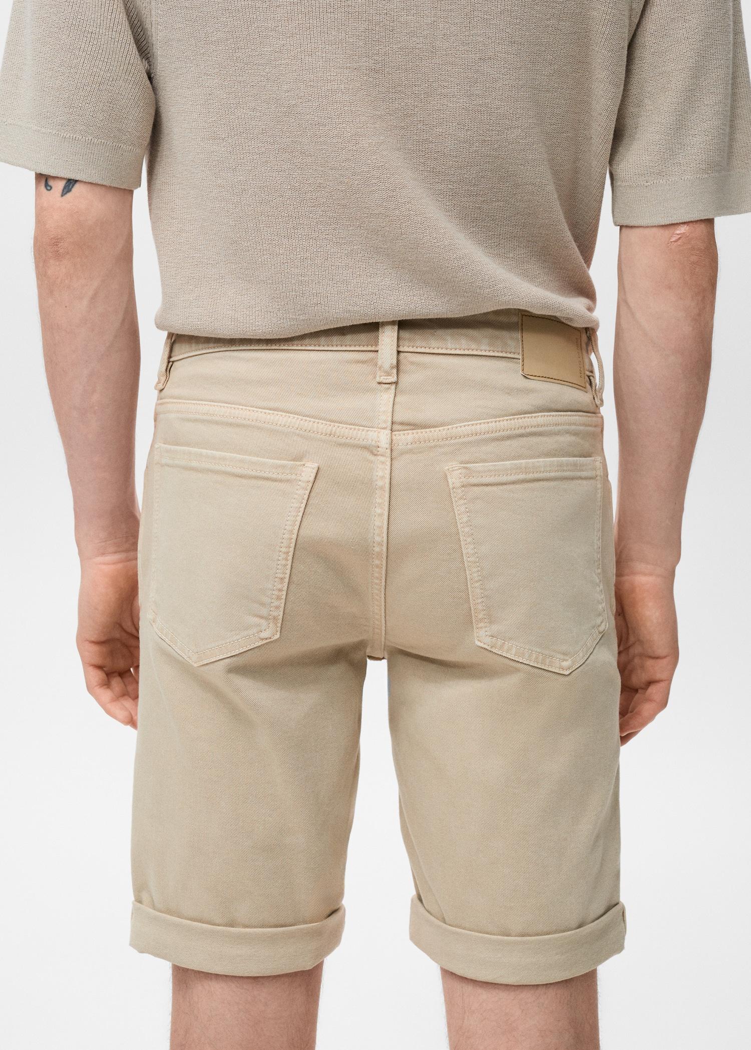 Slim-fit denim bermuda shorts - Men | MANGO USA Product Image