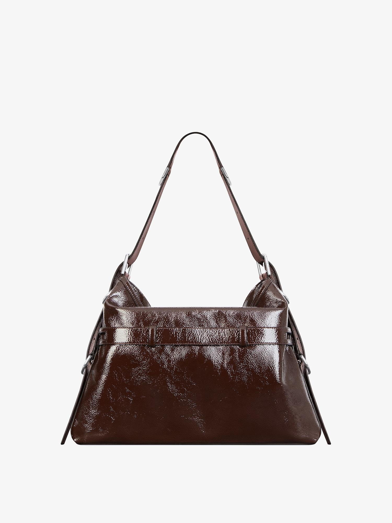 Medium Voyou bag in patent leather with multi-buckles Product Image