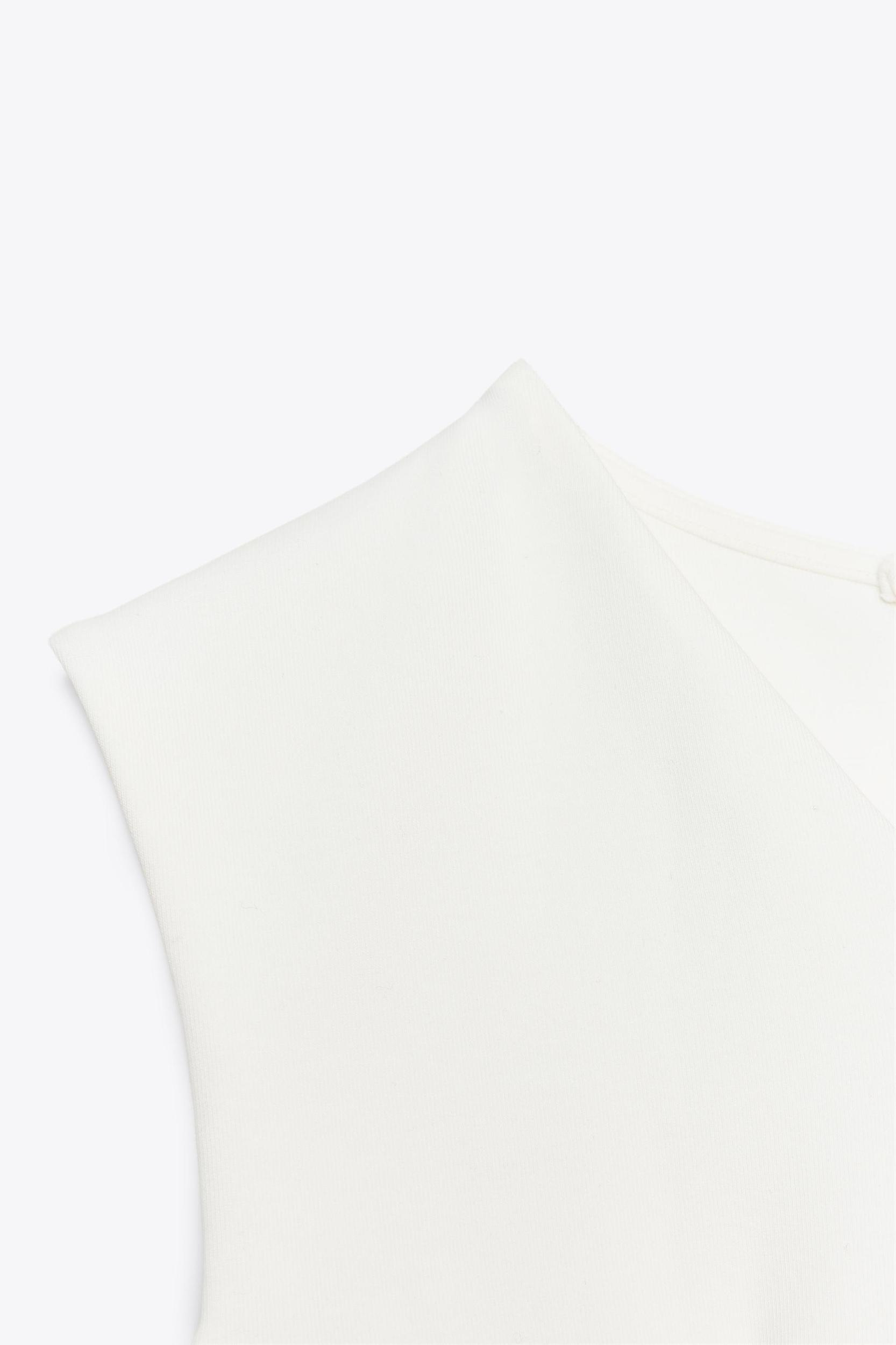 SLEEVELESS INTERLOCK PEPLUM TOP Product Image