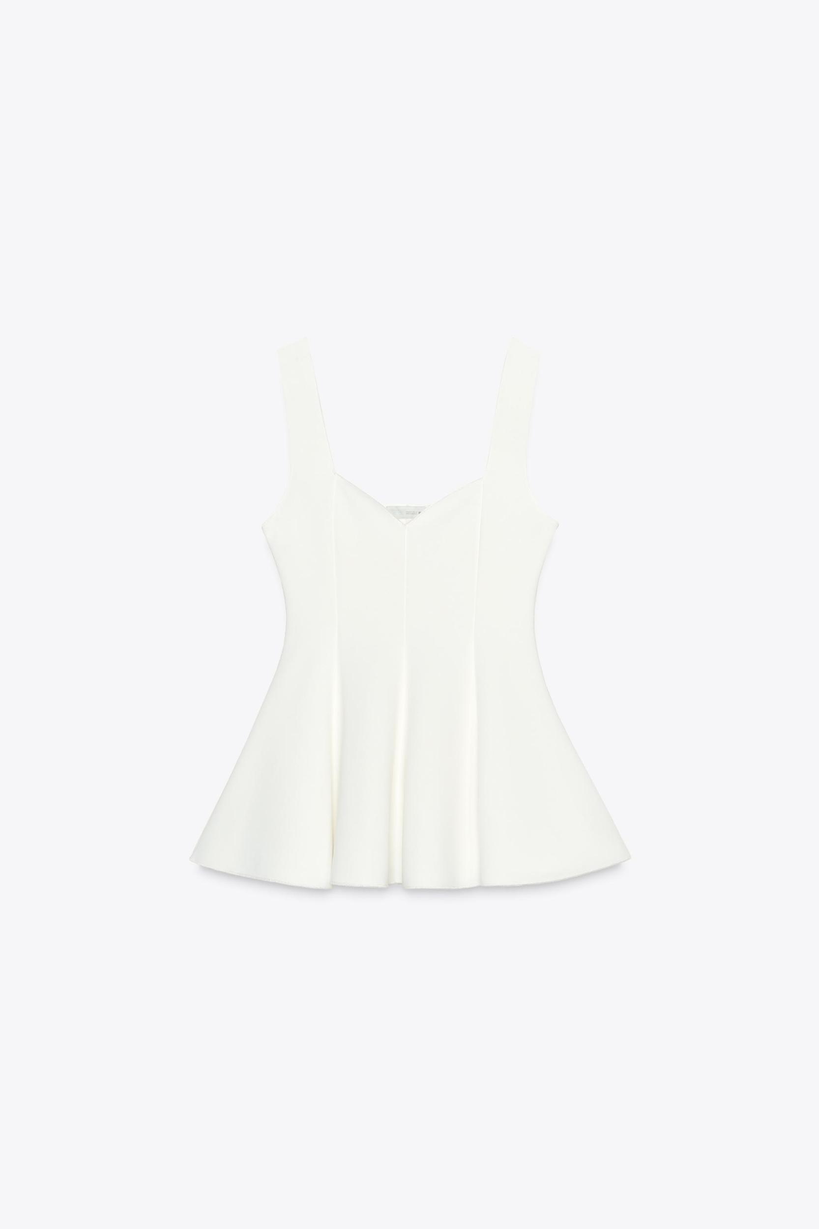 PEPLUM STRETCH TOP Product Image