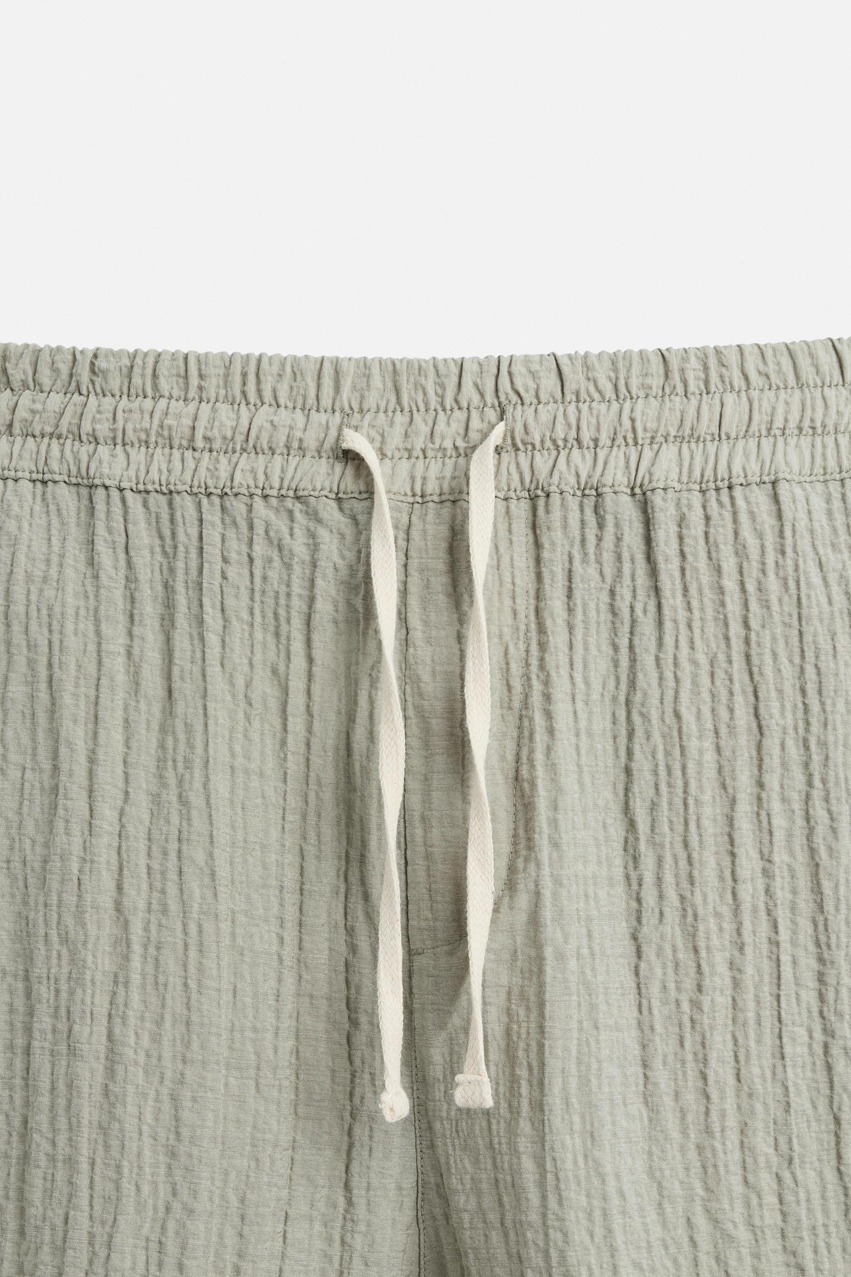 WRINKLED EFFECT JACQUARD BERMUDA SHORTS Product Image