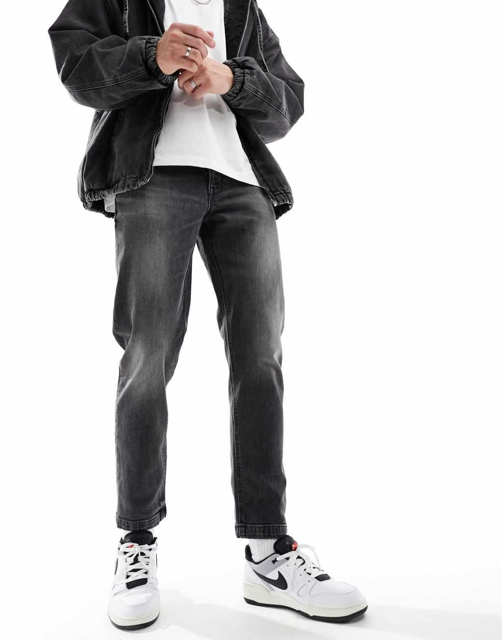 ASOS DESIGN stretch tapered jeans in washed black Product Image