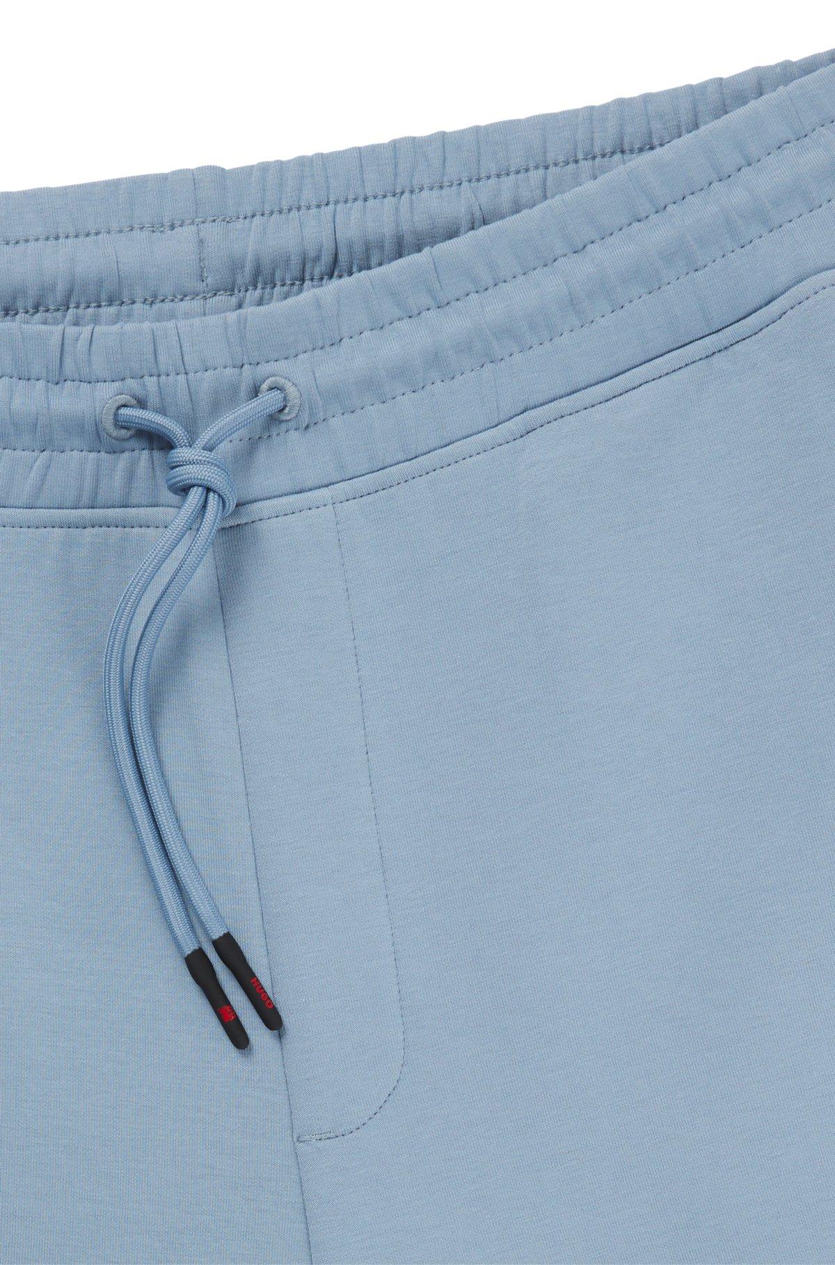 HUGO x RB tracksuit bottoms with piping details Product Image