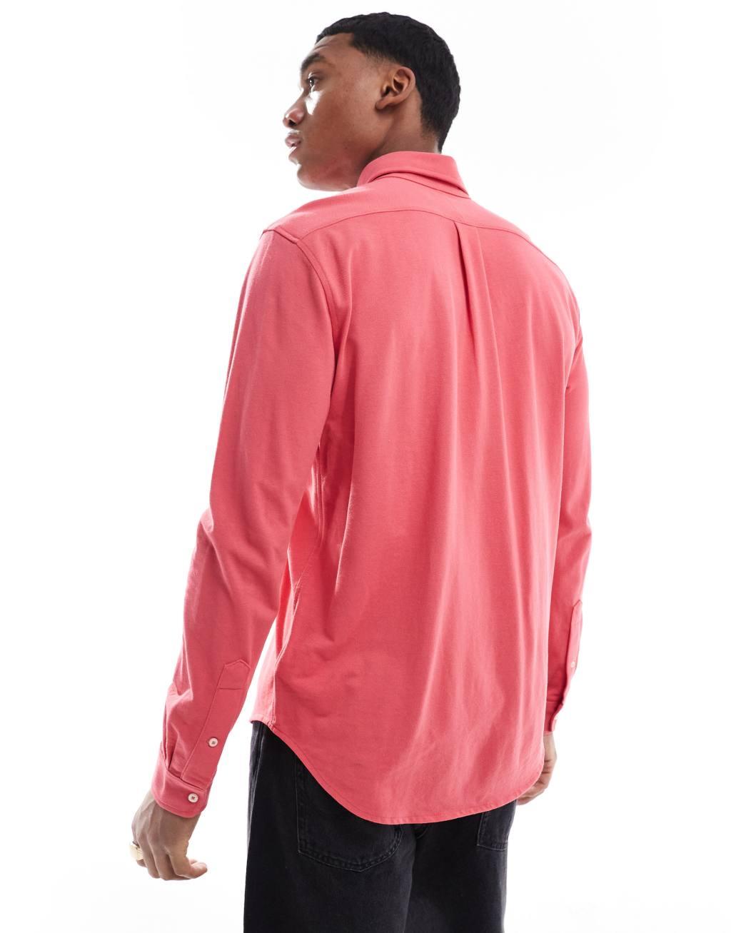 Polo Ralph Lauren icon logo pique shirt in pale red Product Image