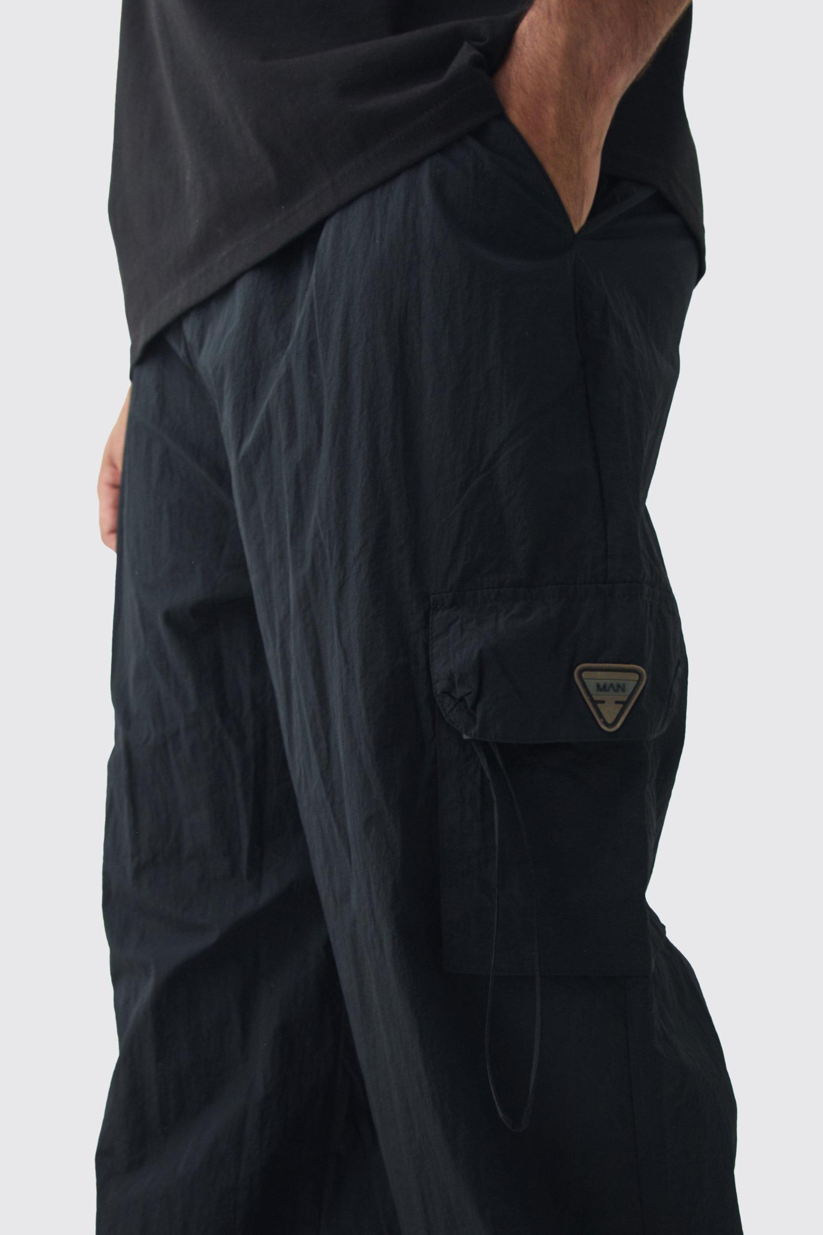 Plus Crinkle Nylon Cargo Parachute Pants In Black | boohooMAN USA Product Image