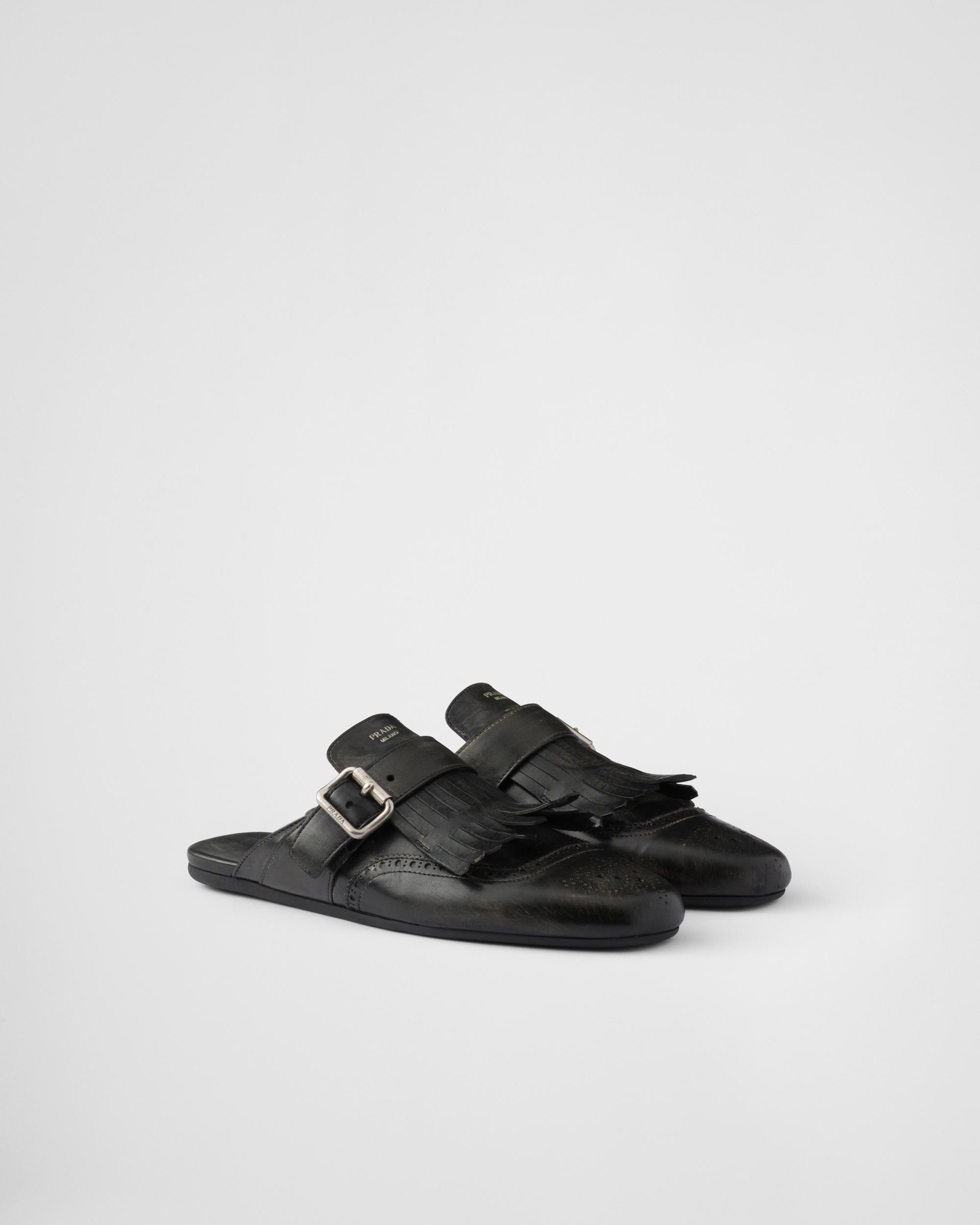 Shuffle fringed leather mules Product Image