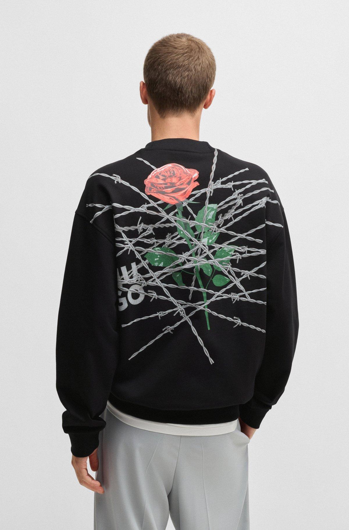 Cotton-terry relaxed-fit sweatshirt with seasonal prints Product Image