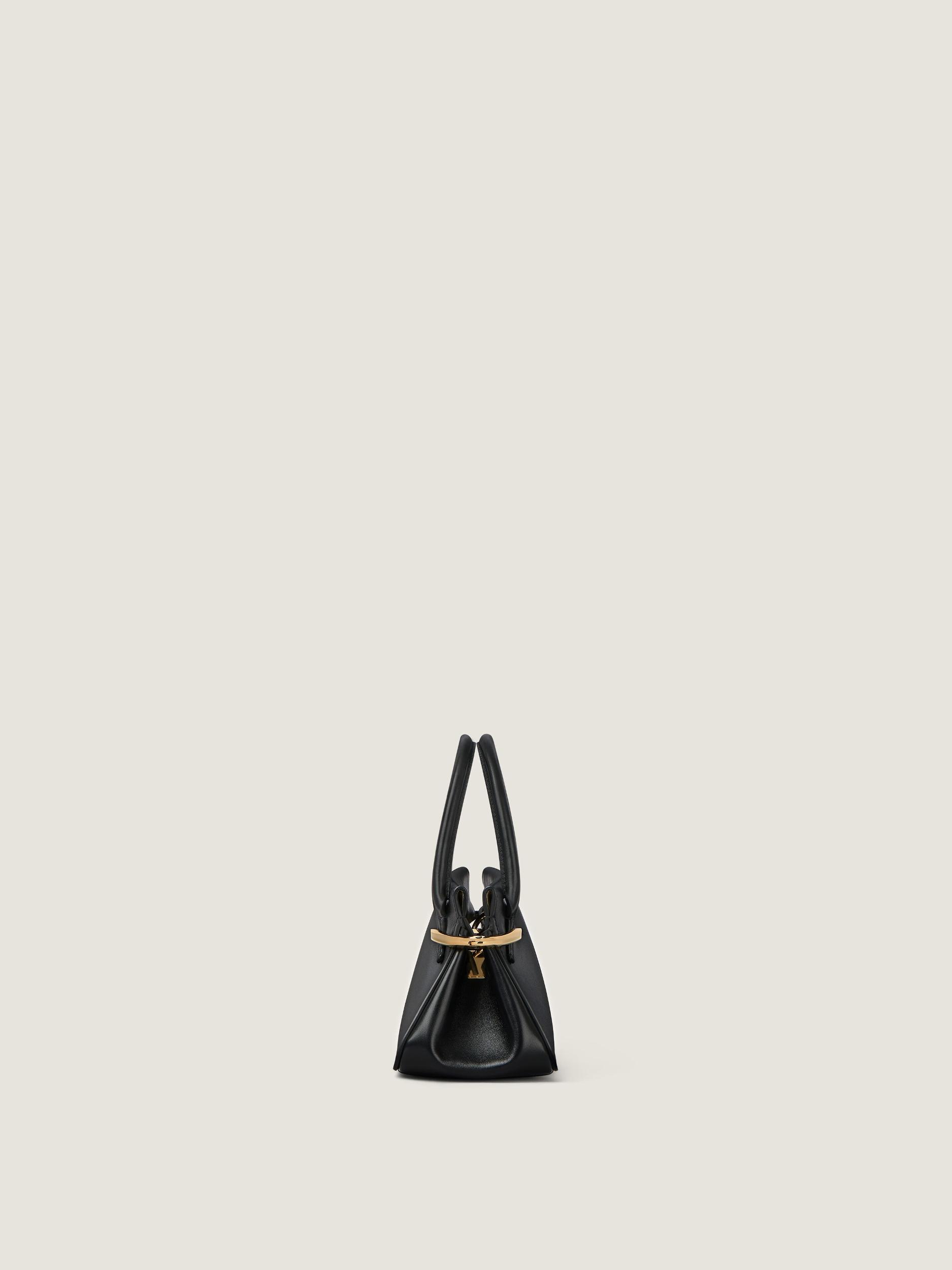 Mini Pinch bag in leather Product Image
