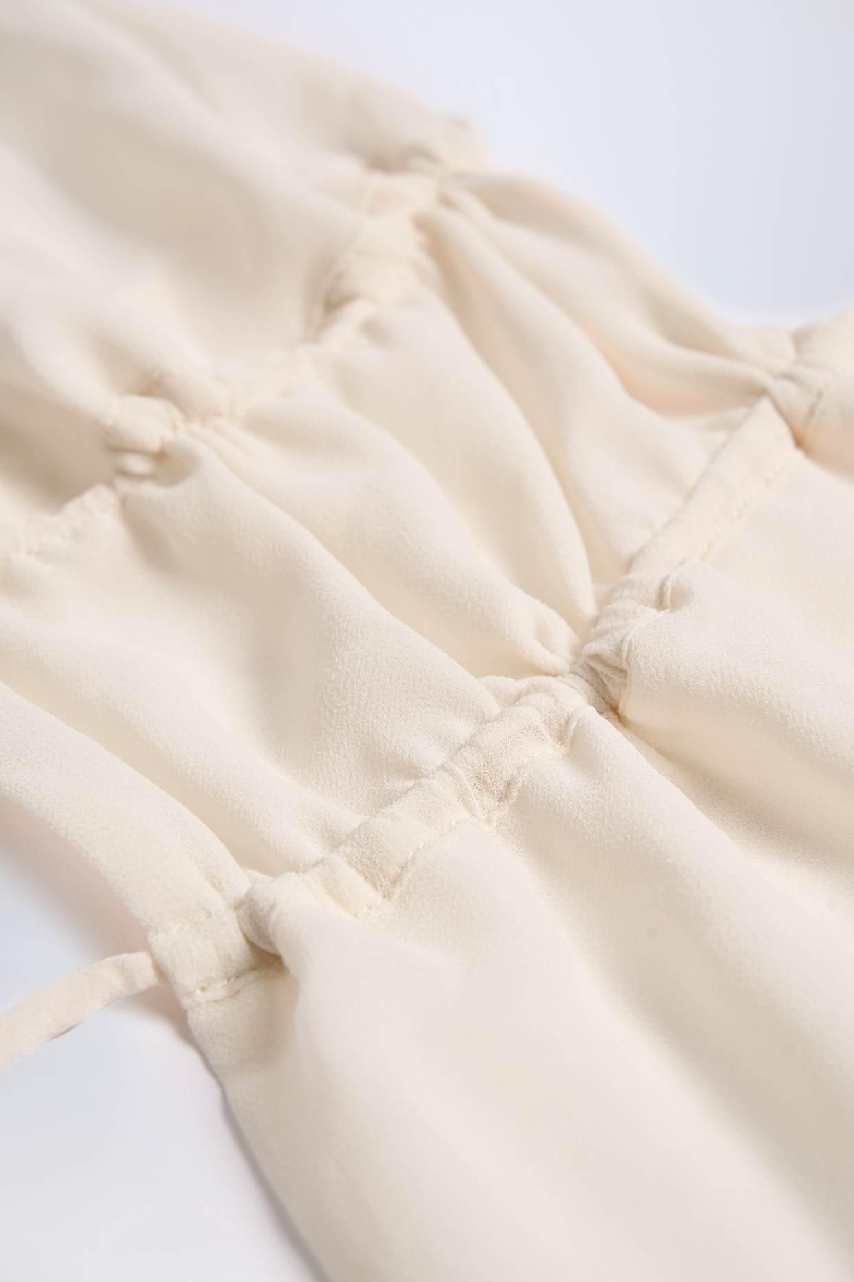 Cut-Out Semi-Sheer Ruched Halterneck Crop Top in Ivory Product Image