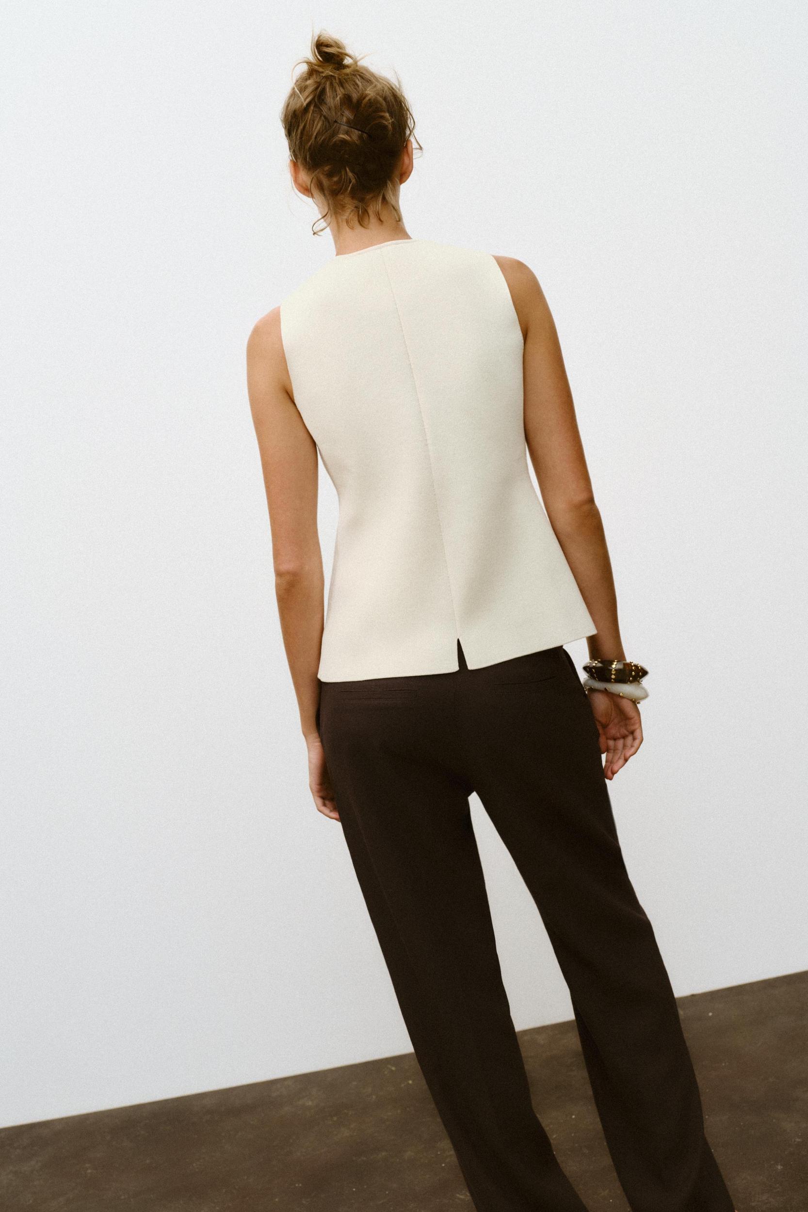 COVERED BUTTON KNIT VEST Product Image