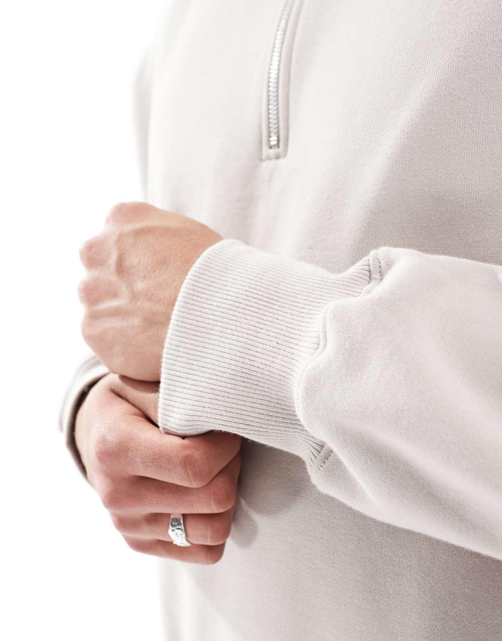 ASOS DESIGN premium heavyweight oversized quarter zip sweatshirt 400gsm in beige Product Image