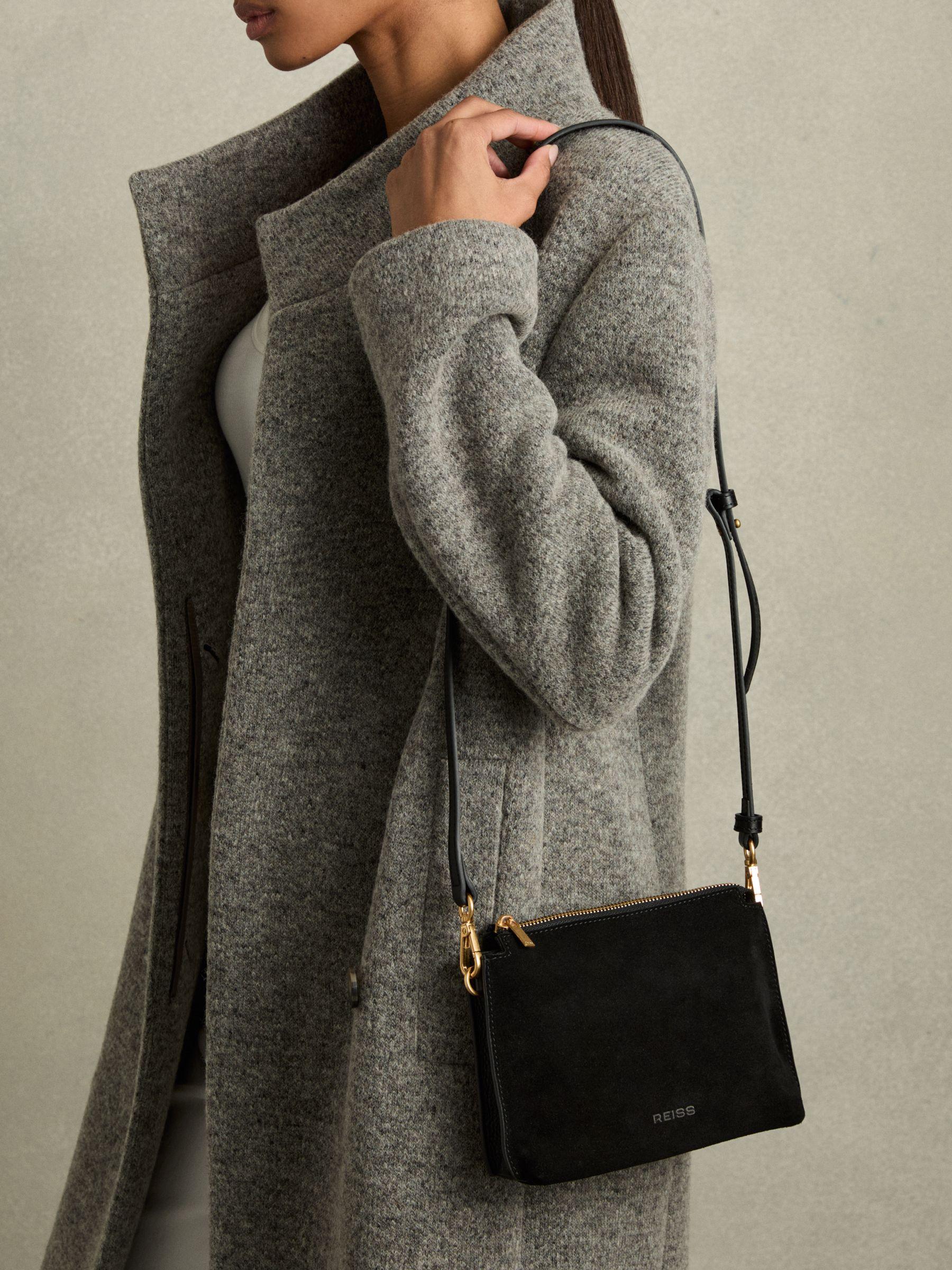 Leather And Suede Crossbody Bag in Black Product Image