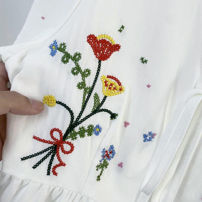 Puff-Sleeve V-Neck Floral Embroidered Bow Peplum Blouse / Elastic Waist Mini A-Line Skirt Product Image