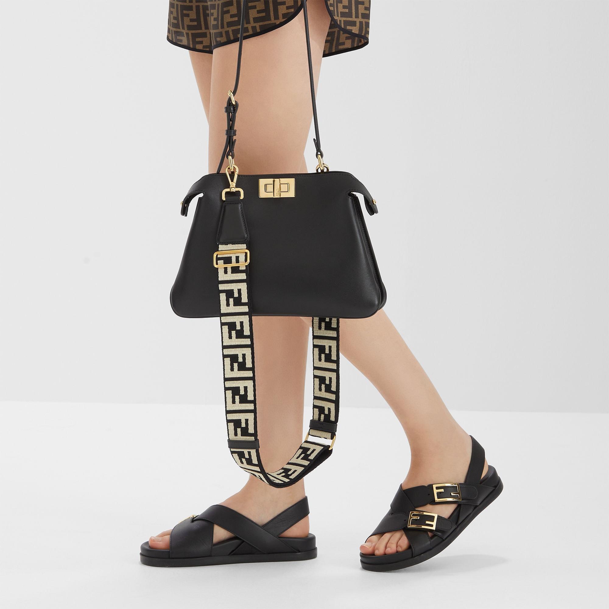 Fendi FeelBlack leather slides Product Image