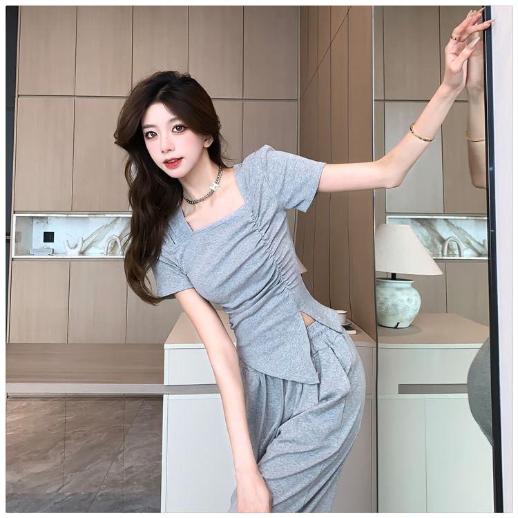 Set: Short-Sleeve Asymmetrical Neck Ruched Slit Slim Fit T-Shirt + Drawstring Waist Loose Fit Sweatpants Product Image