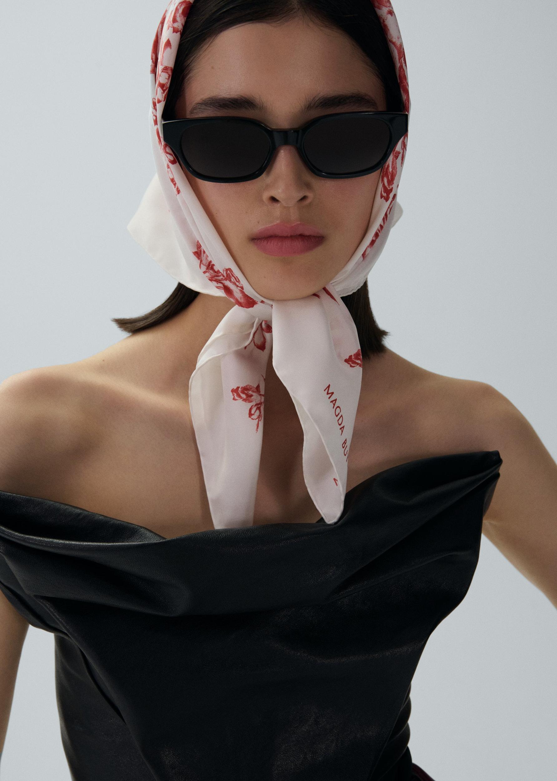 Draped strapless leather corset in black Product Image